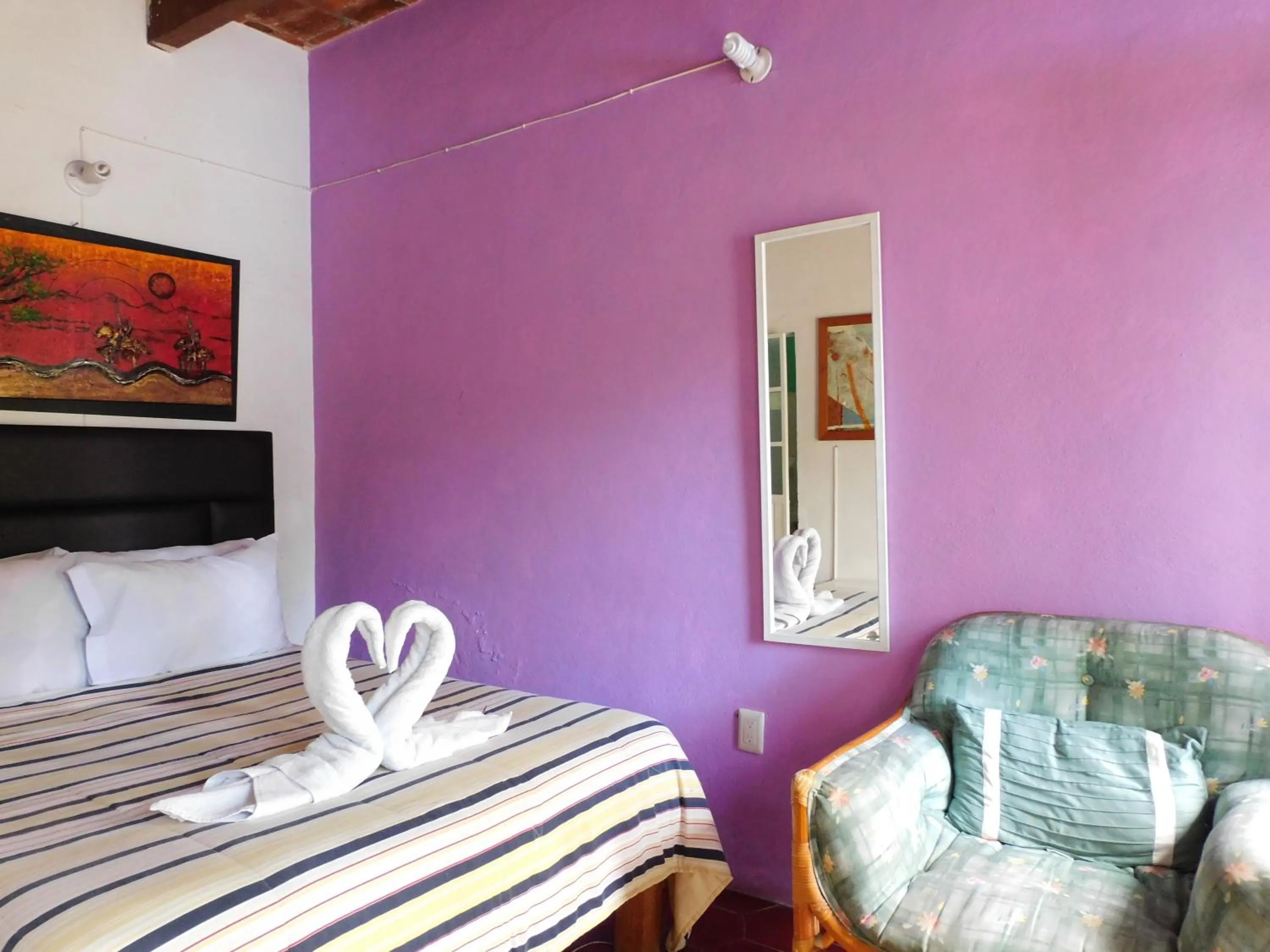 Bed in Hotel Elohim by Rotamundos