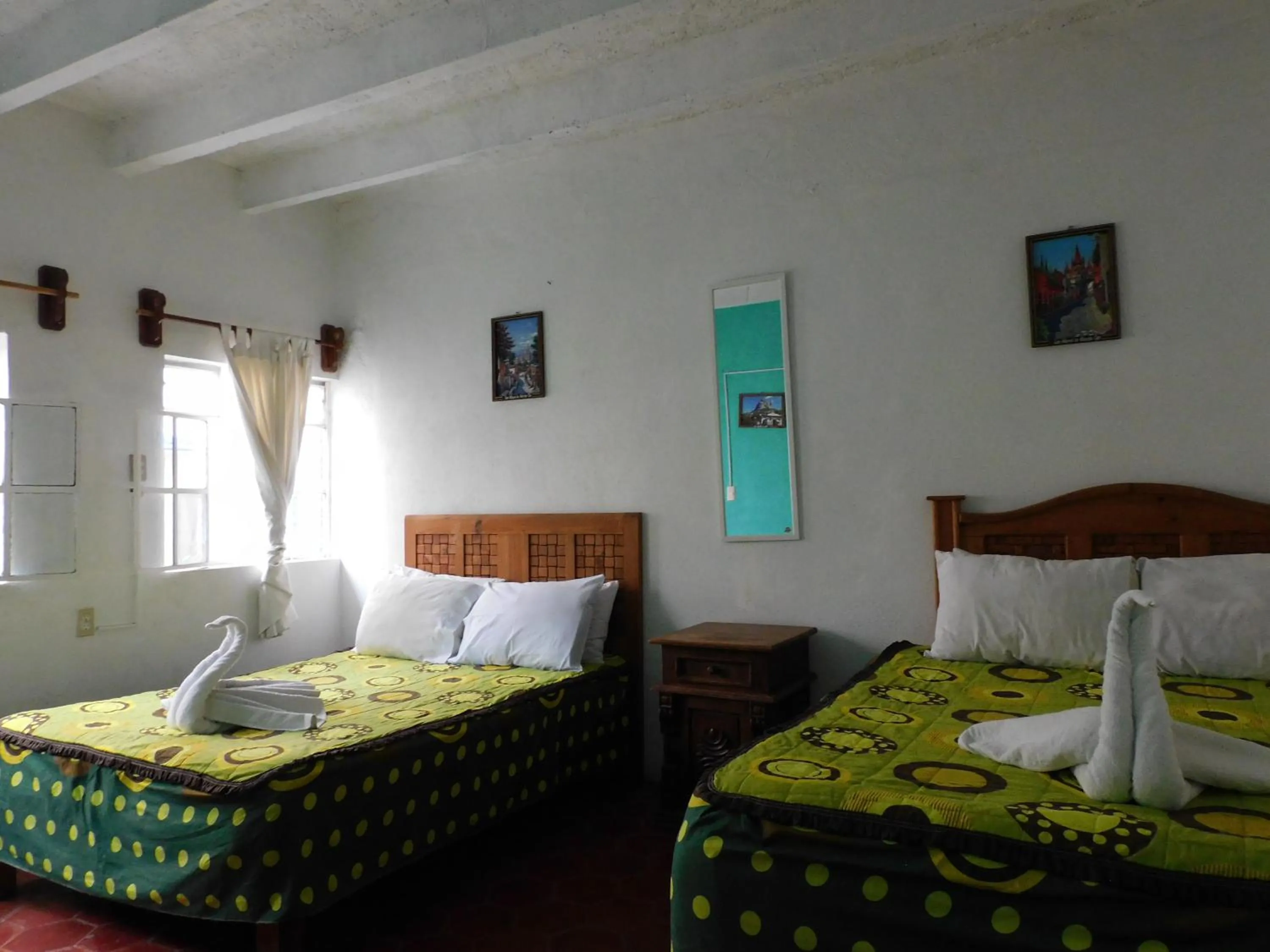 Bed in Hotel Elohim by Rotamundos