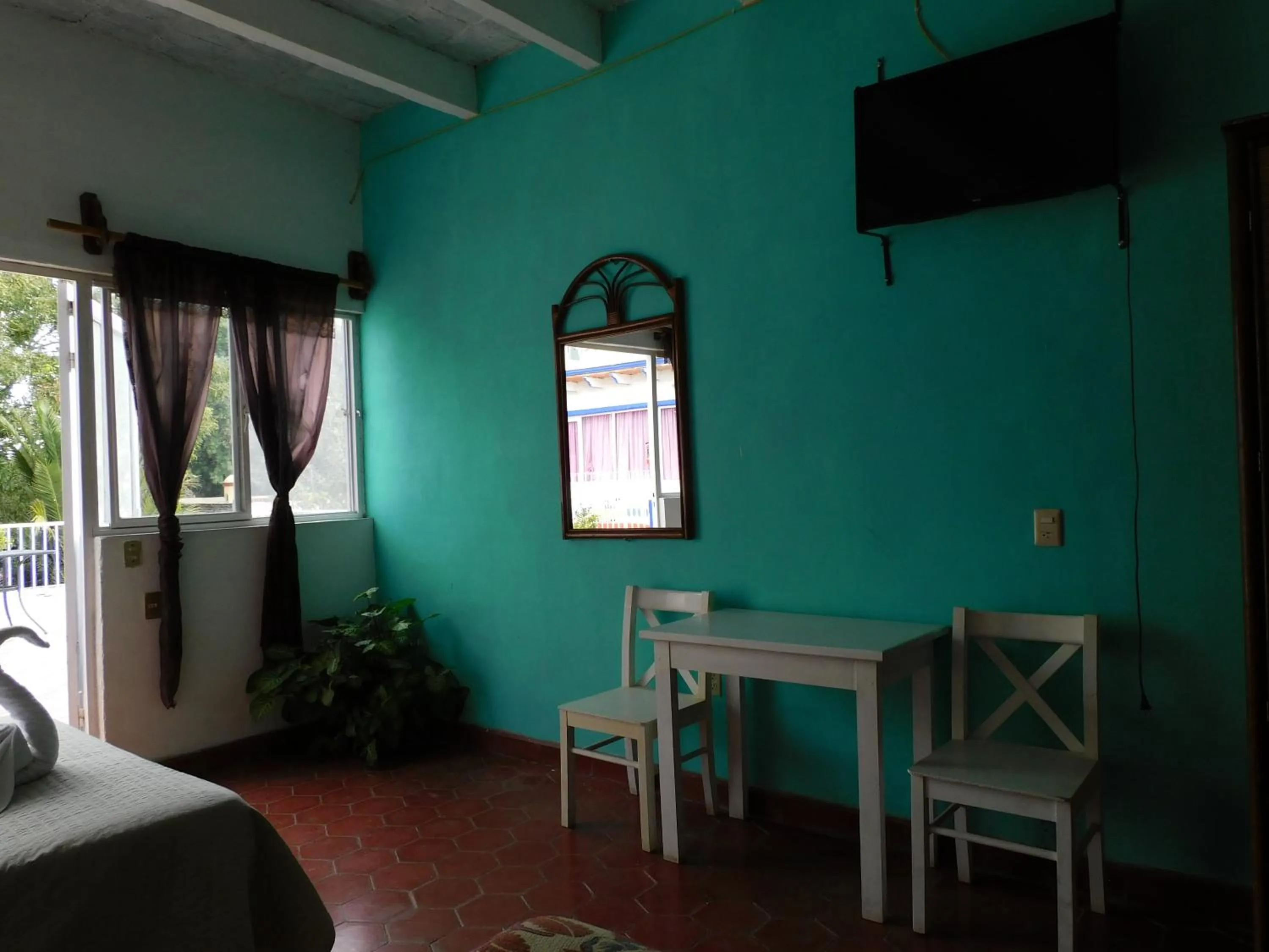 TV/Entertainment Center in Hotel Elohim by Rotamundos