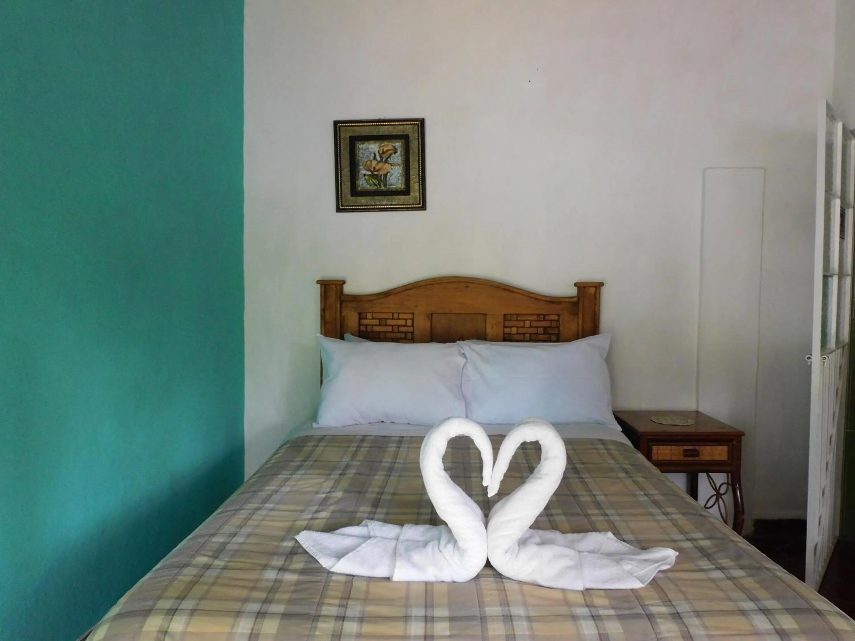 Bed in Hotel Elohim by Rotamundos