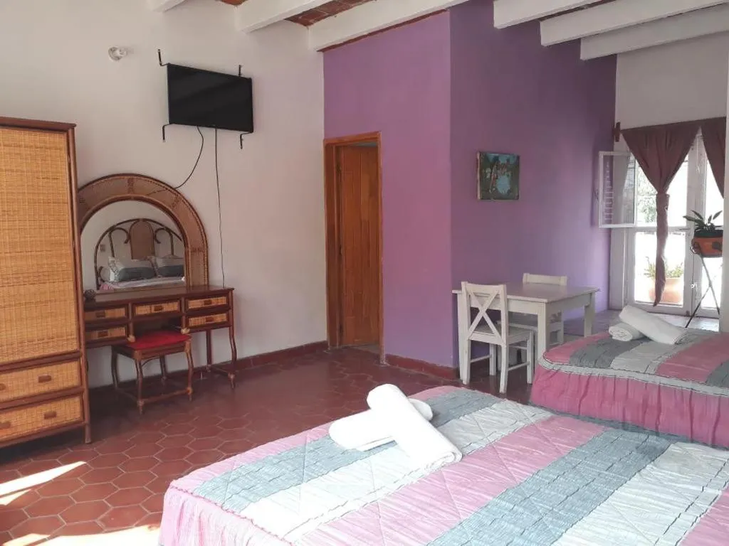 TV/Entertainment Center in Hotel Elohim by Rotamundos