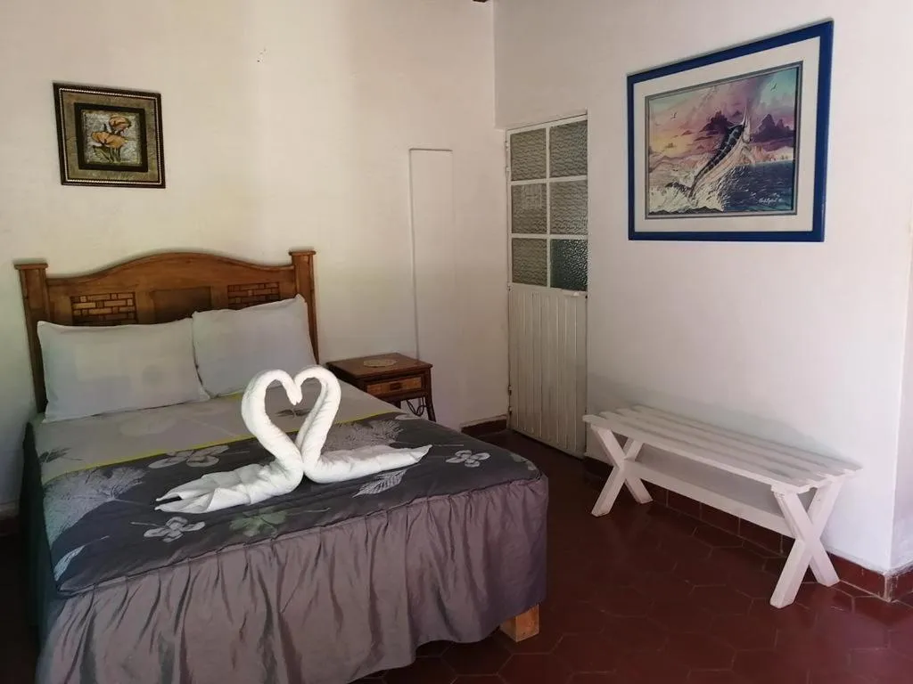 Bed in Hotel Elohim by Rotamundos