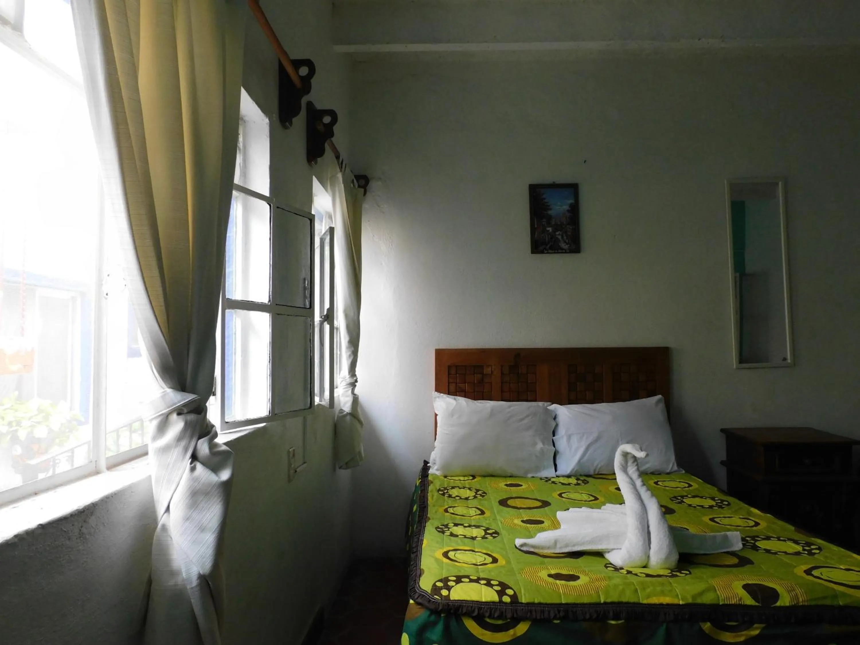 Bed in Hotel Elohim by Rotamundos