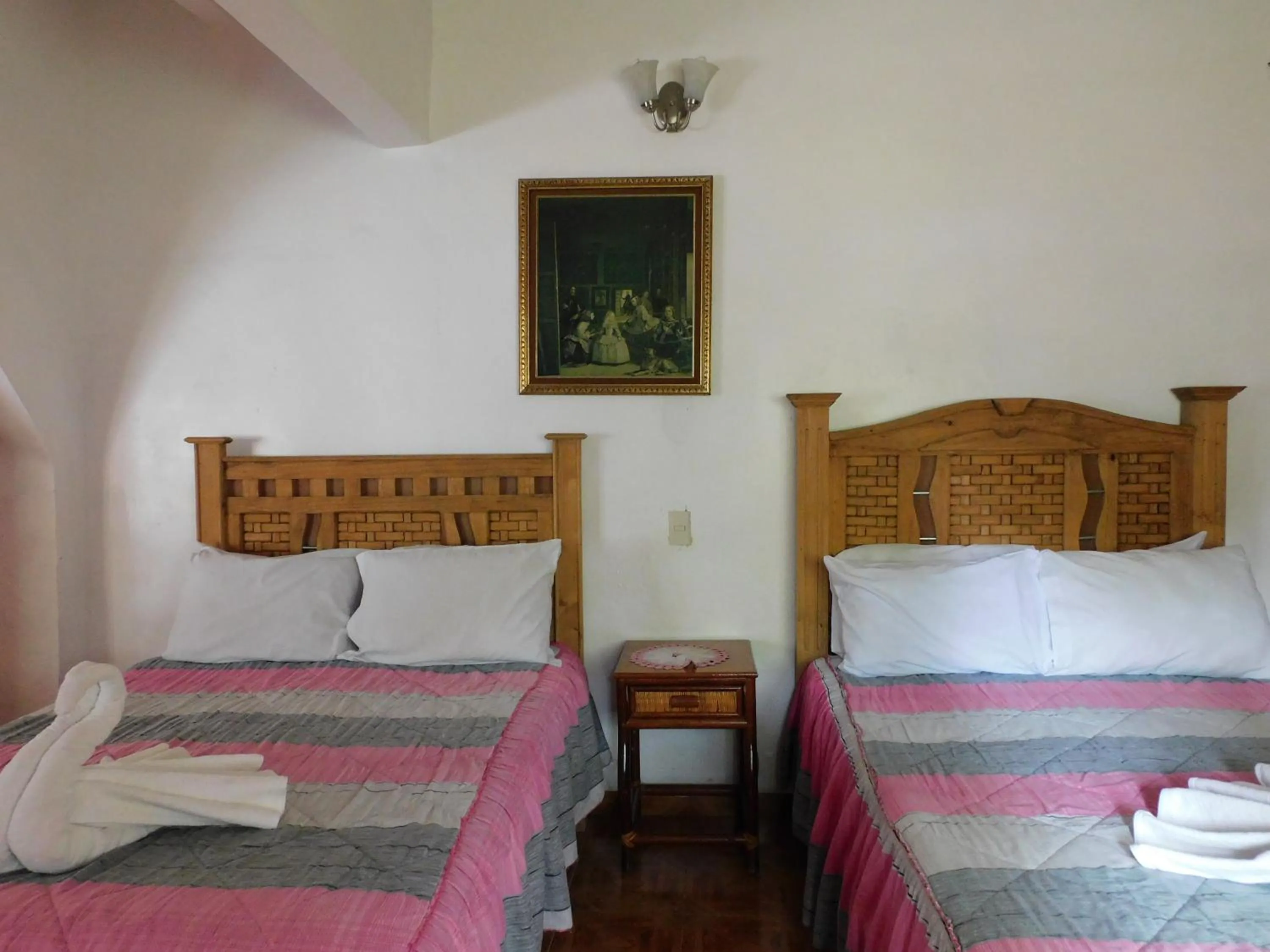 Bed in Hotel Elohim by Rotamundos