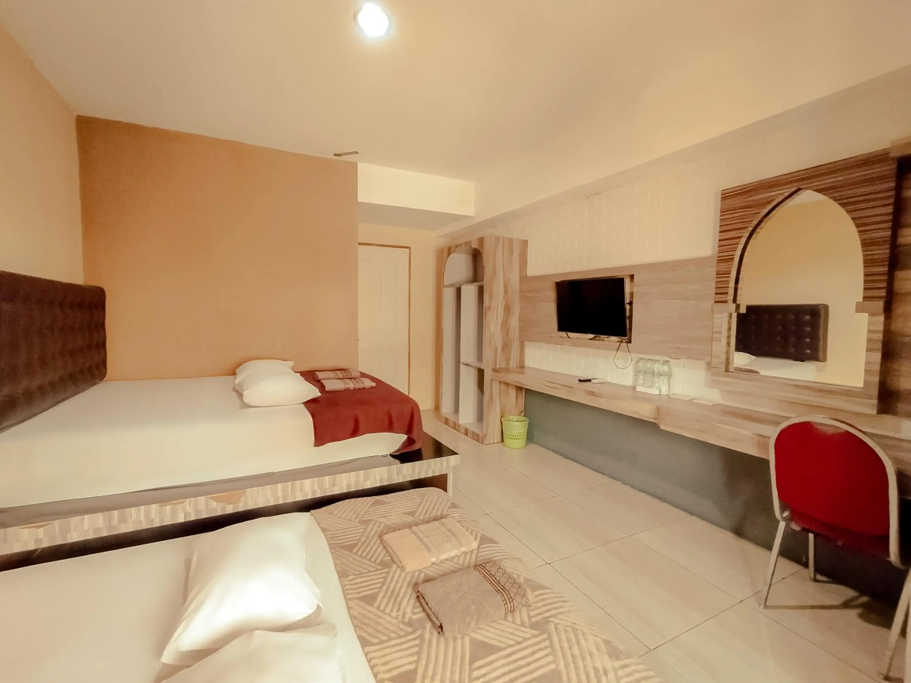 Bed in Hotel Syariah Larismanis