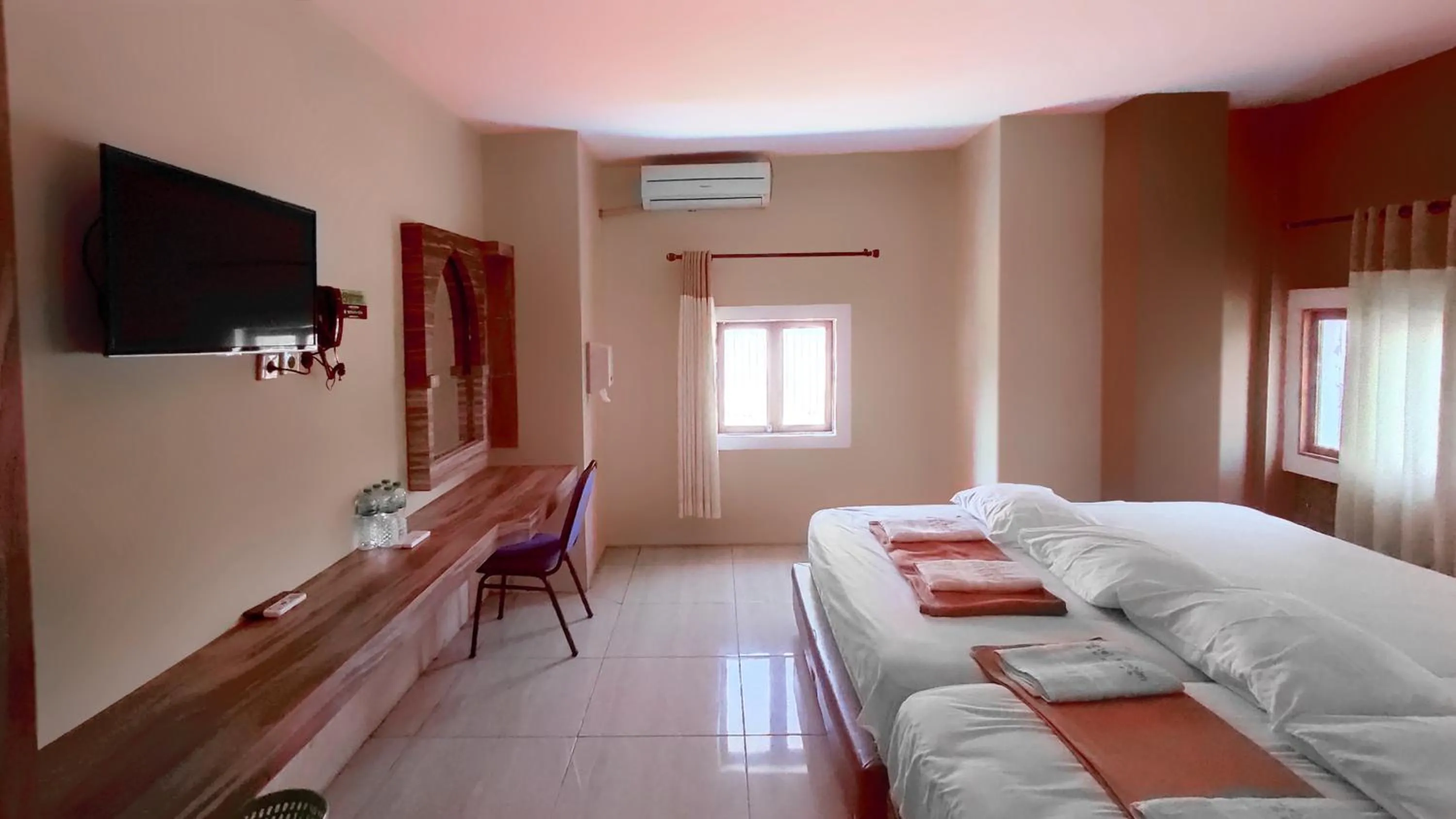 Bed in Hotel Syariah Larismanis