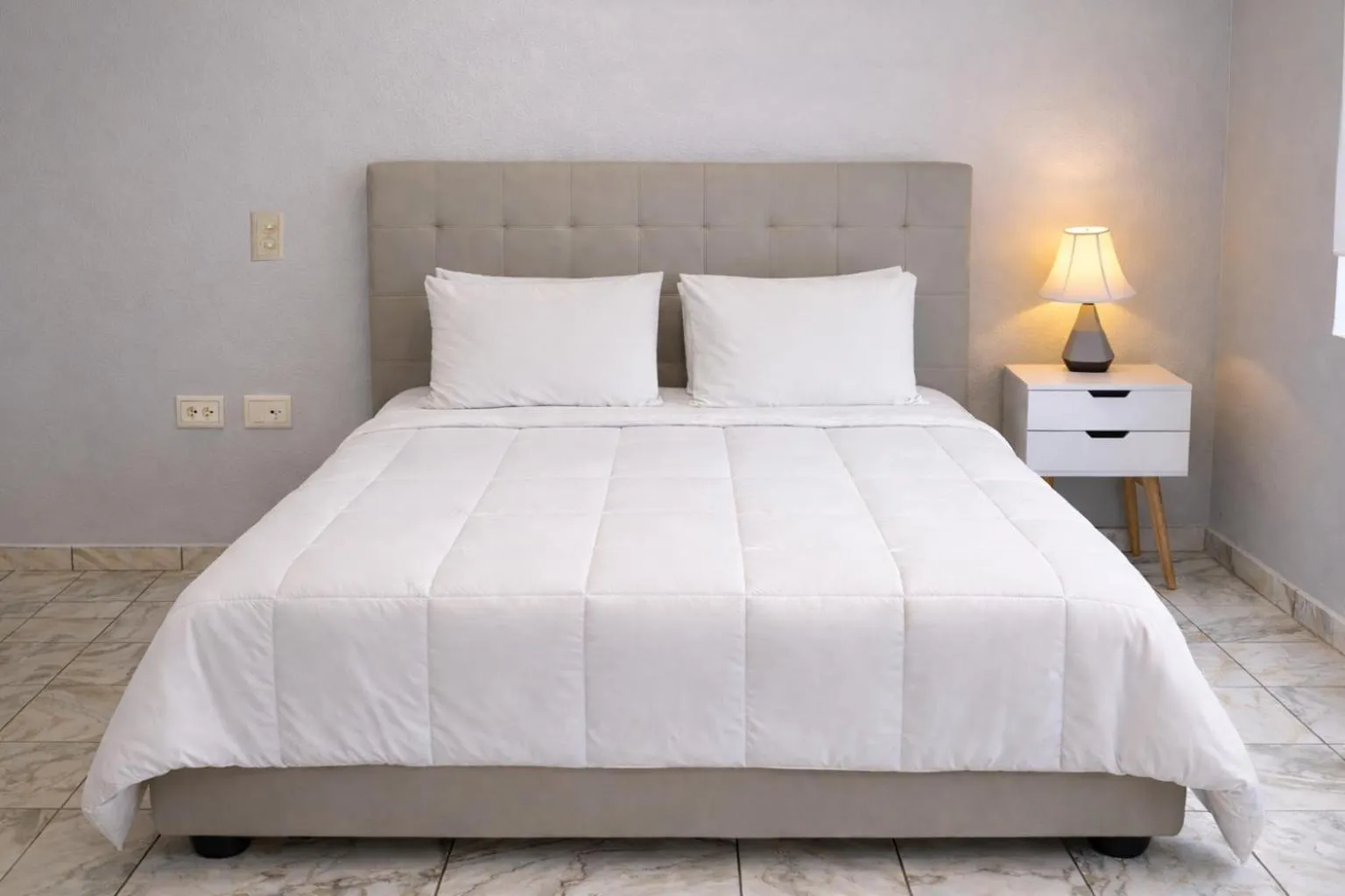 Bed in Coral Princess Hotel