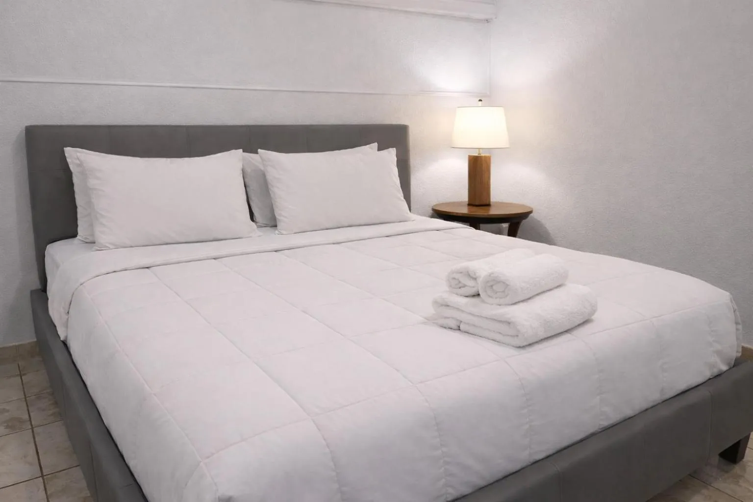 Bed in Coral Princess Hotel