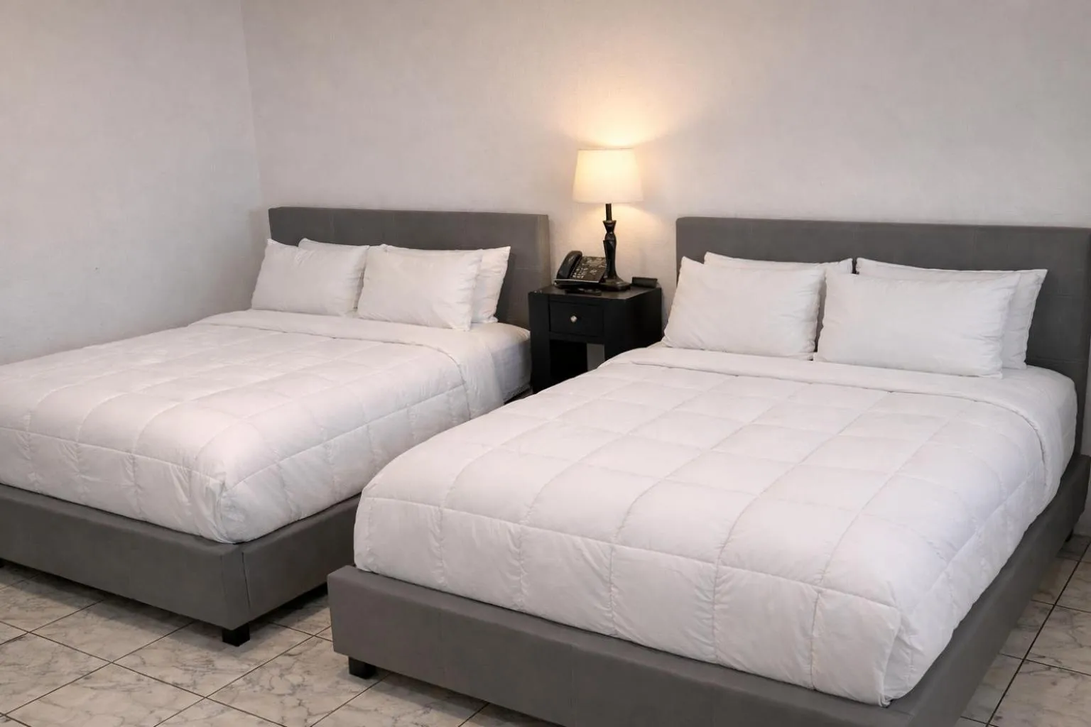 Bed in Coral Princess Hotel