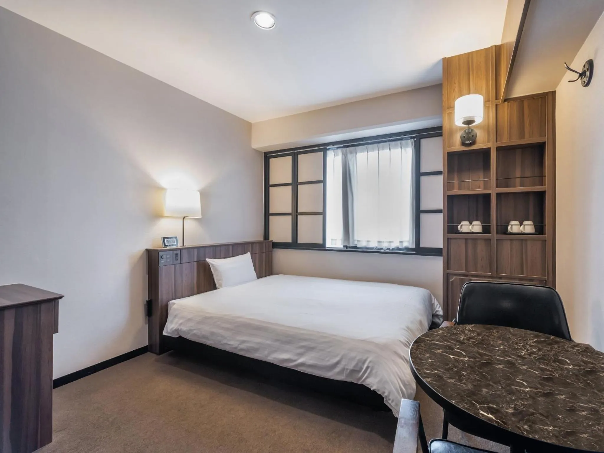 Photo of the whole room, Bed in Sunhotel Fukuyama