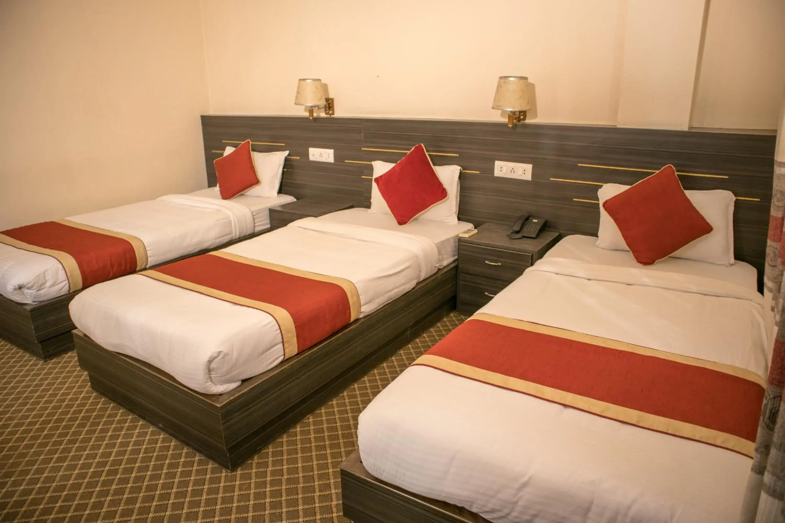 Deluxe Triple Room in Mirage Inn Deluxe Triple Room in Mirage Inn