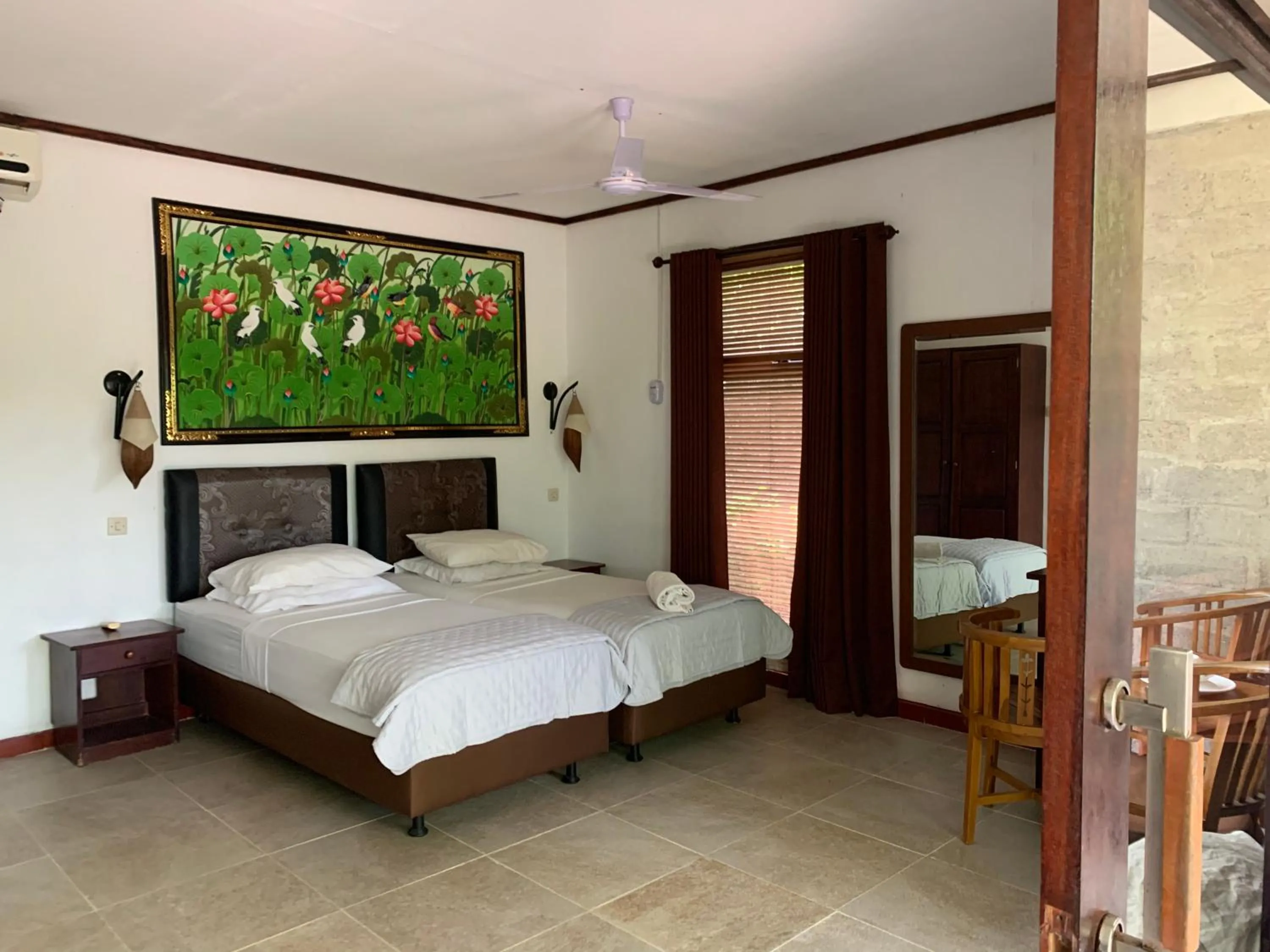 Bed in Kebun Rohani Cottages