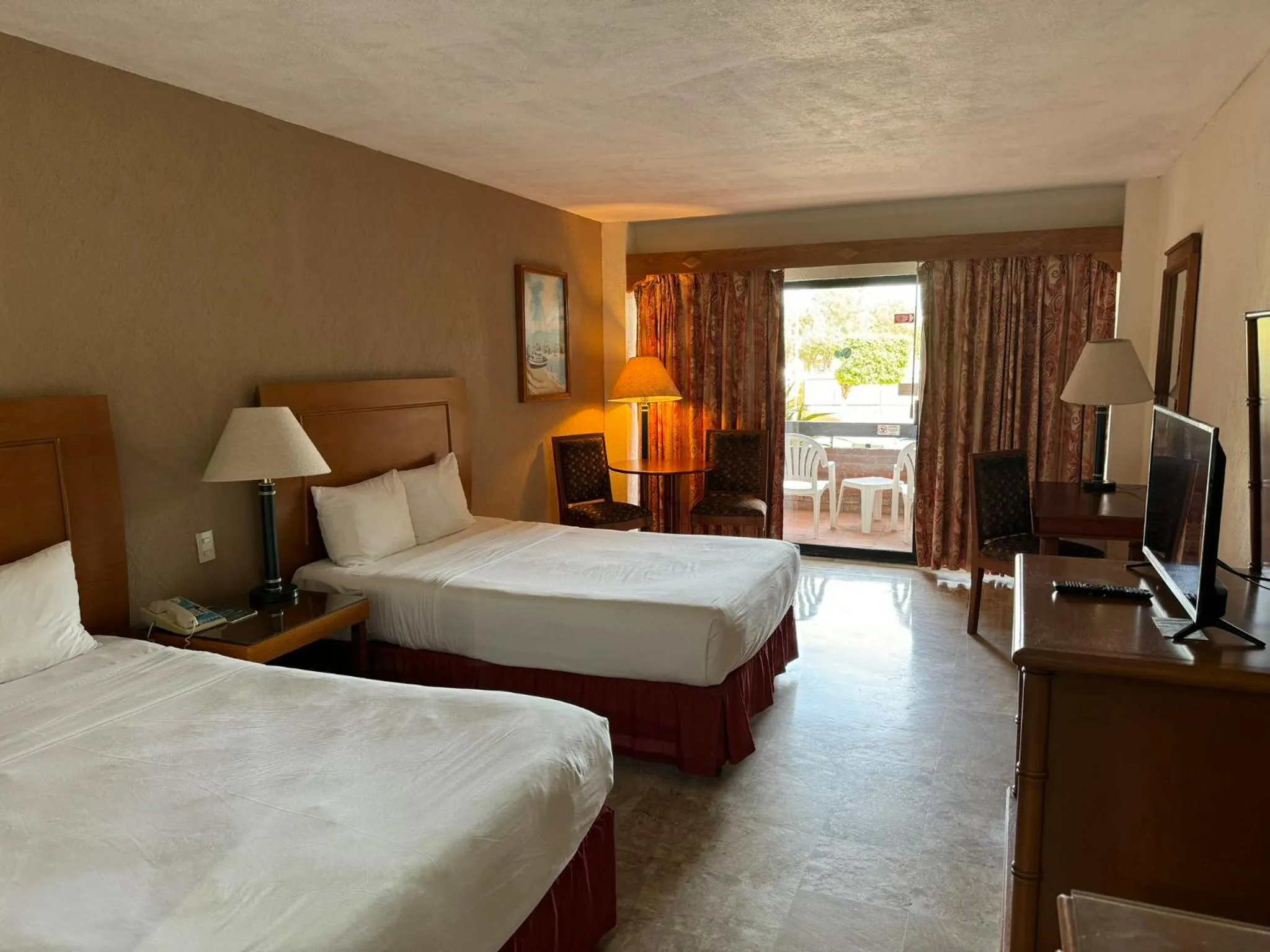 Photo of the whole room, Bed in The Palms Resort of Mazatlan