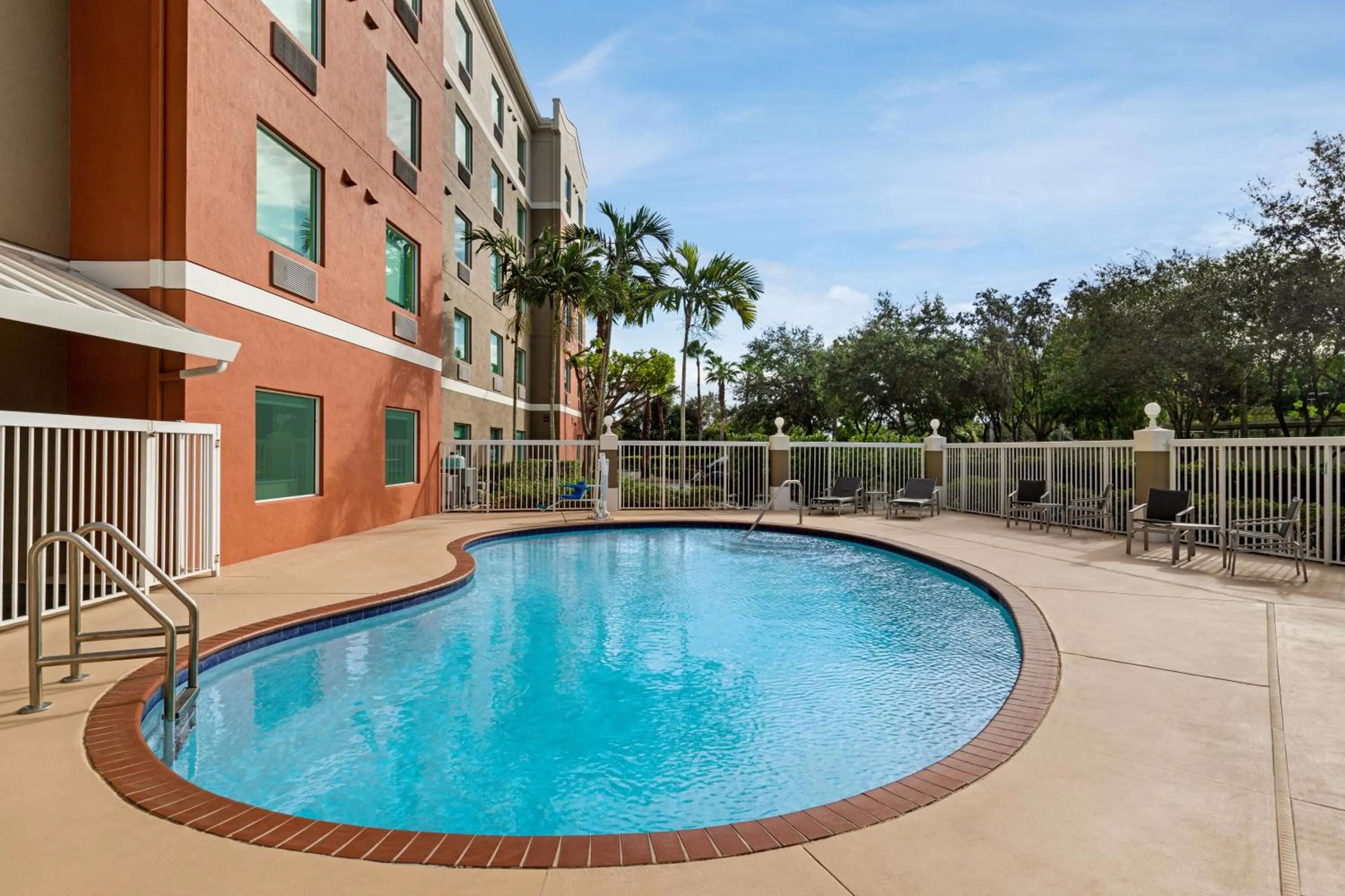 Swimming pool in Holiday Inn Express & Suites Pembroke Pines-Sheridan St by IHG