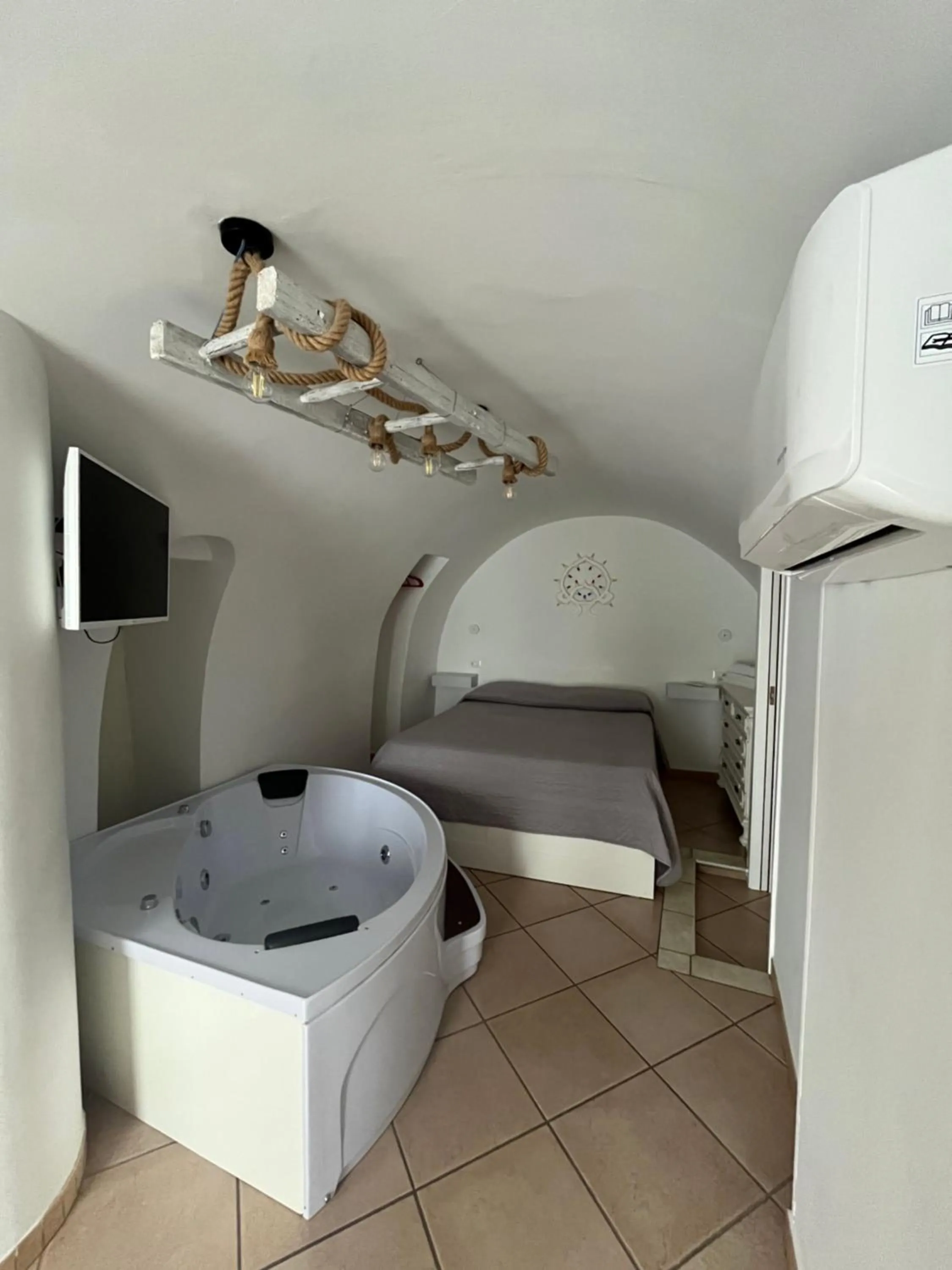 TV and multimedia, Bed in Ostuni 21mq Suite Homes