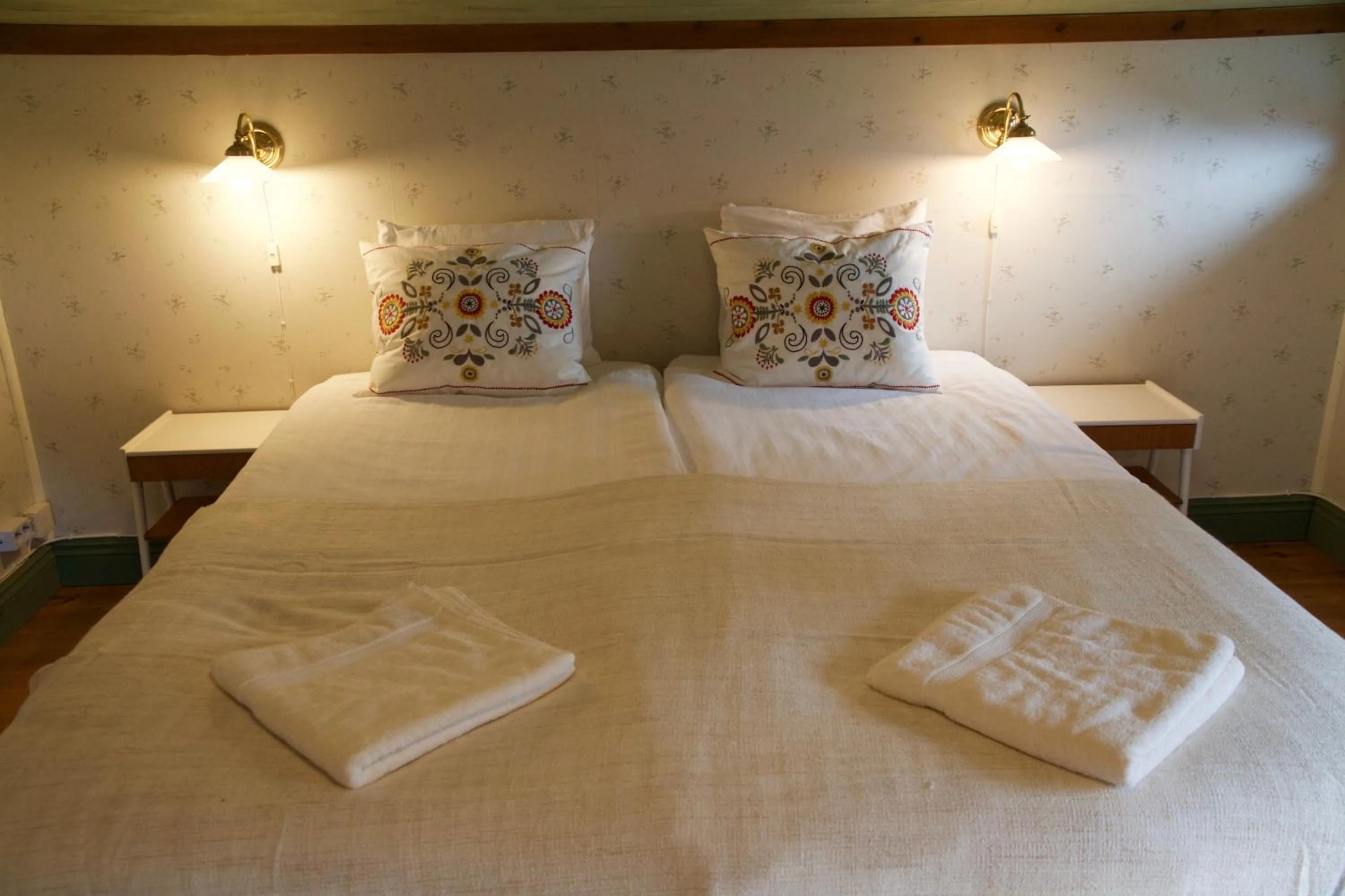 Property building, Bed in THE LODGE Torsby