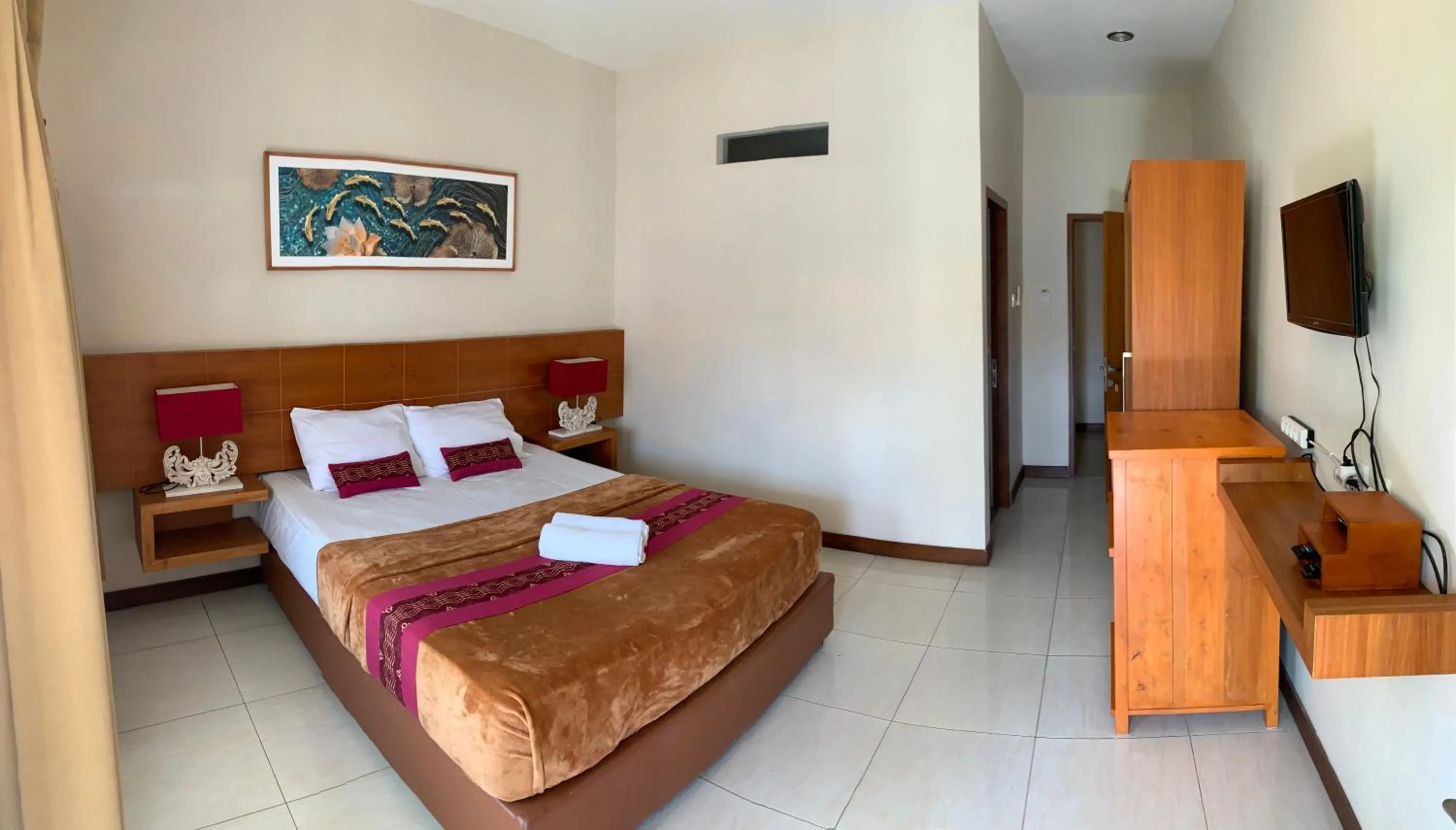 Bed in Kuta Suci Guesthouse