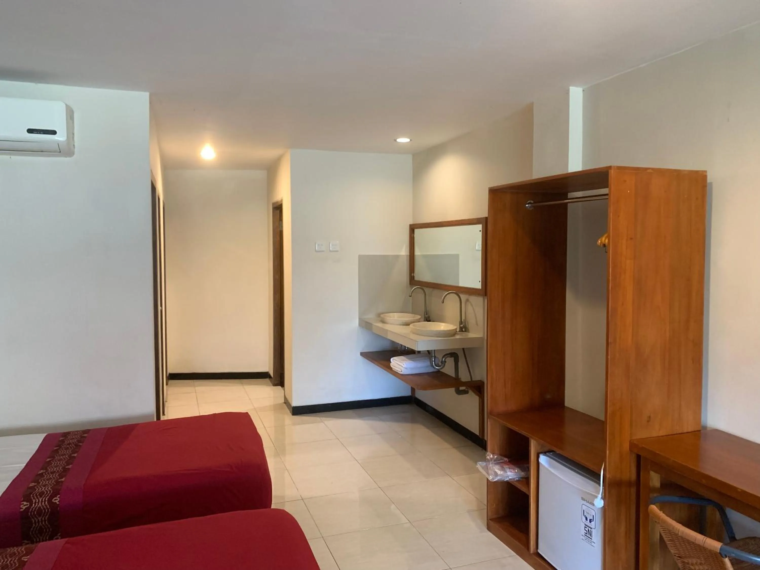 Bed in Kuta Suci Guesthouse