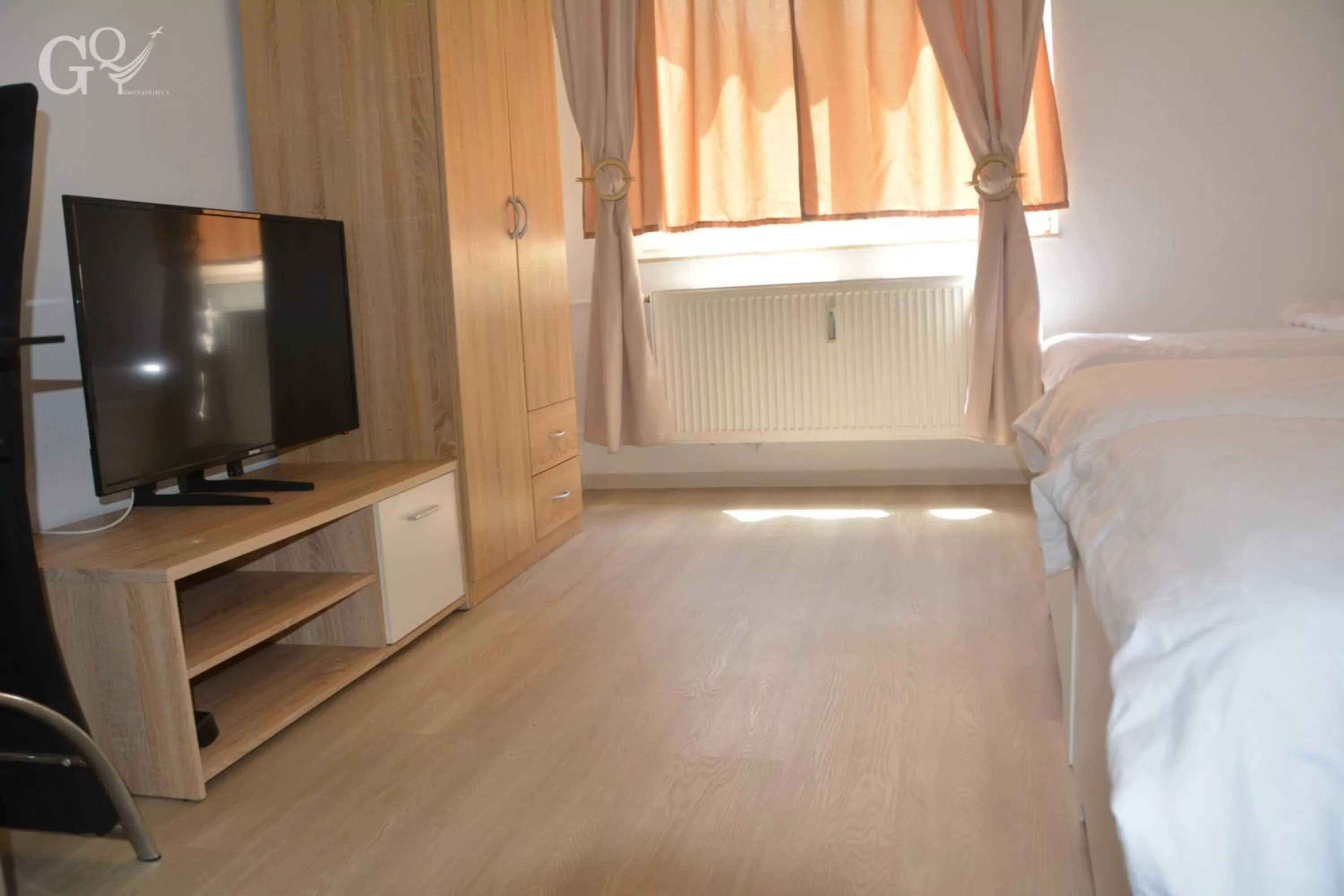 TV and multimedia, Bed in Saarbrücken City Apartments