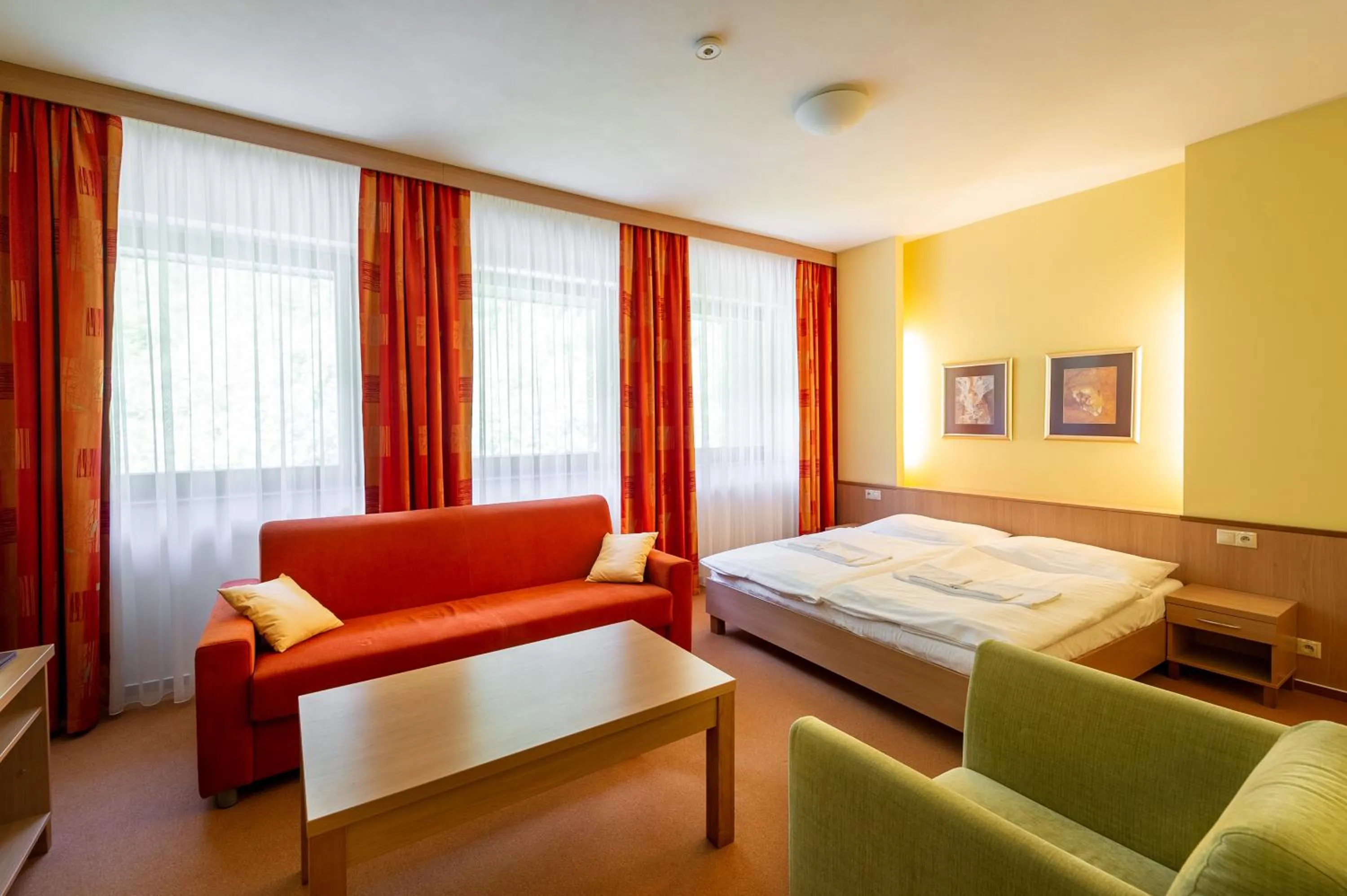 Living room, Bed in Hotel Stupka