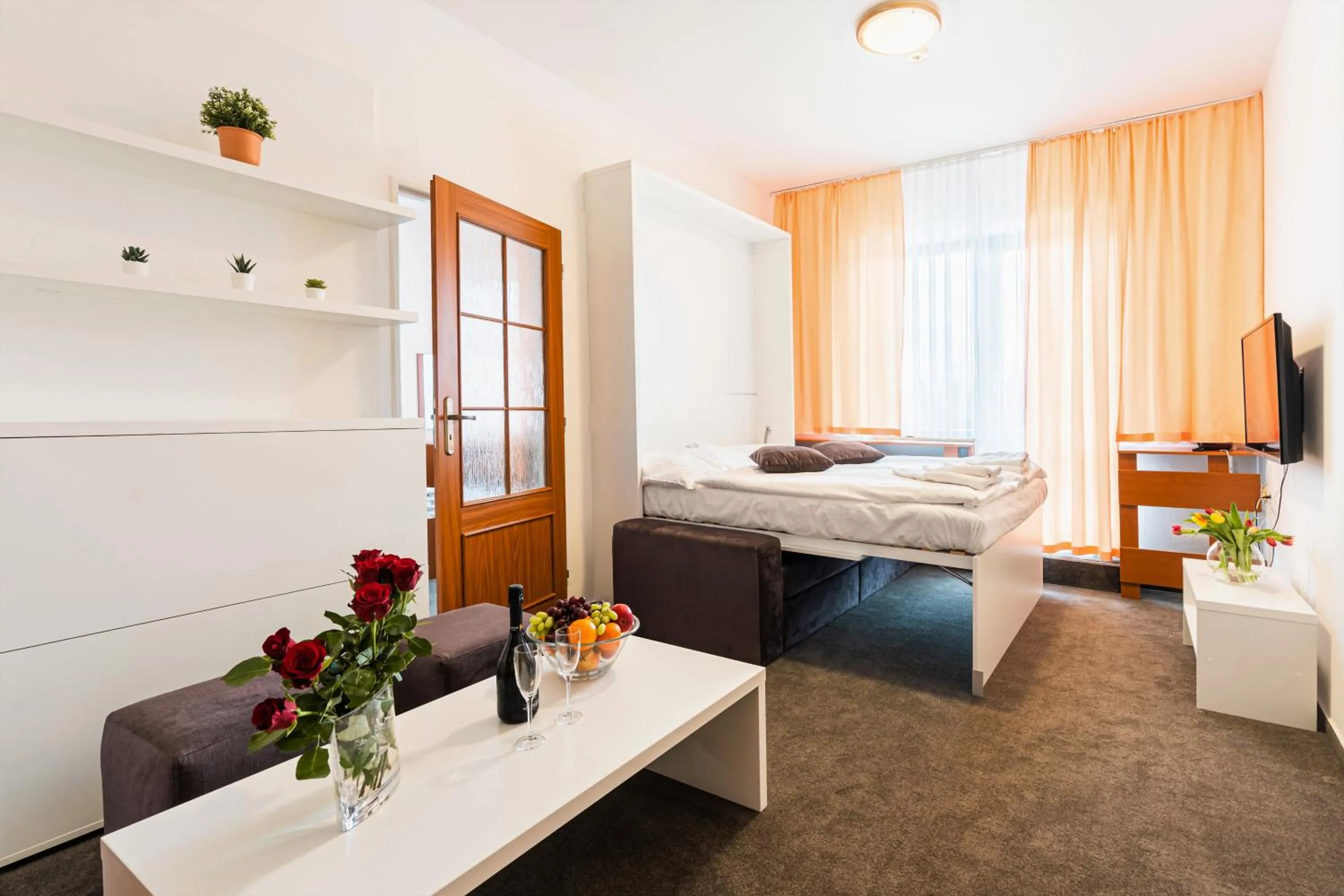 Living room, Bed in Hotel Stupka