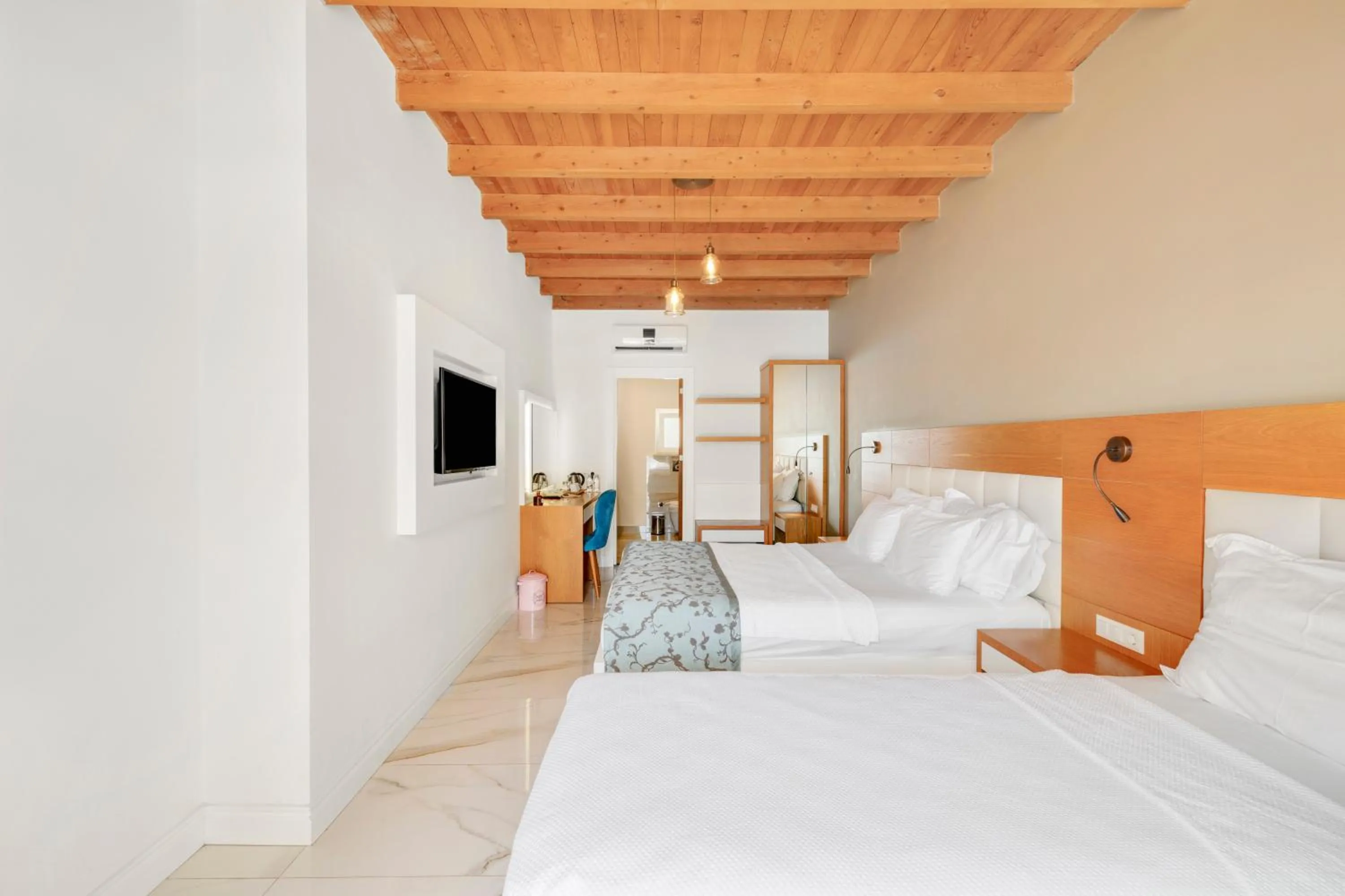 Bed in Blanca Beach Hotel