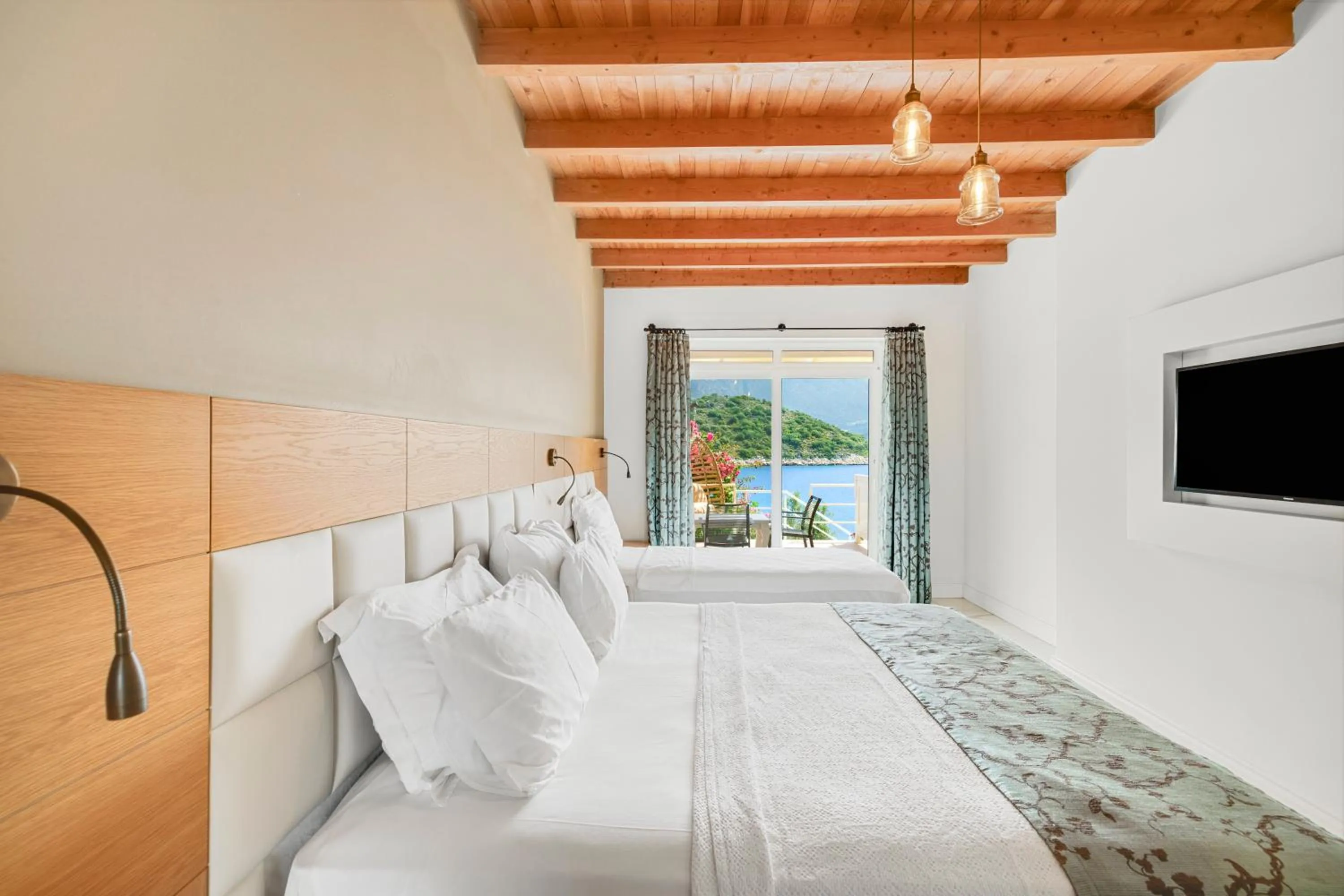 Bed in Blanca Beach Hotel