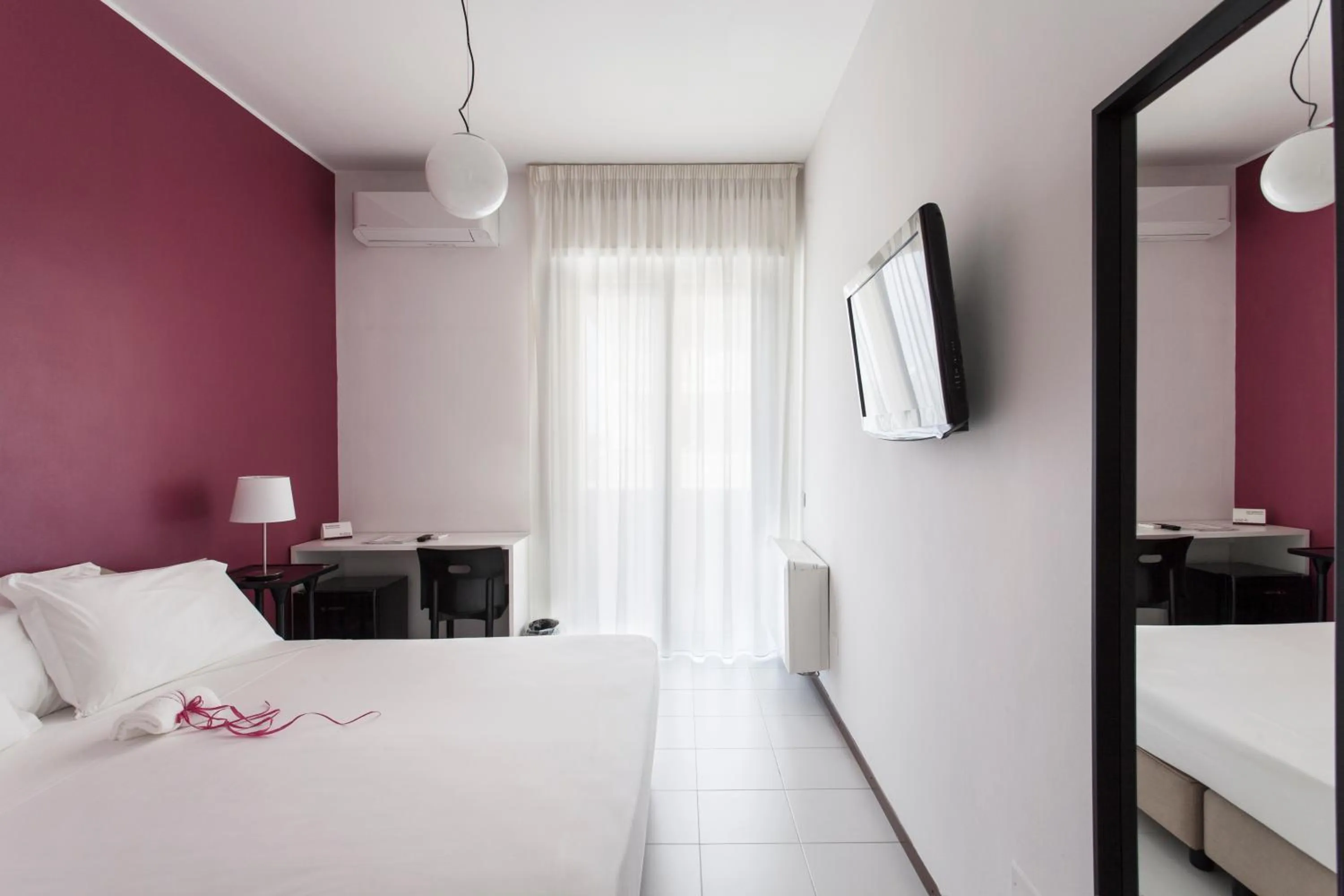 Photo of the whole room, TV/Entertainment Center in Hotel Zenit Salento