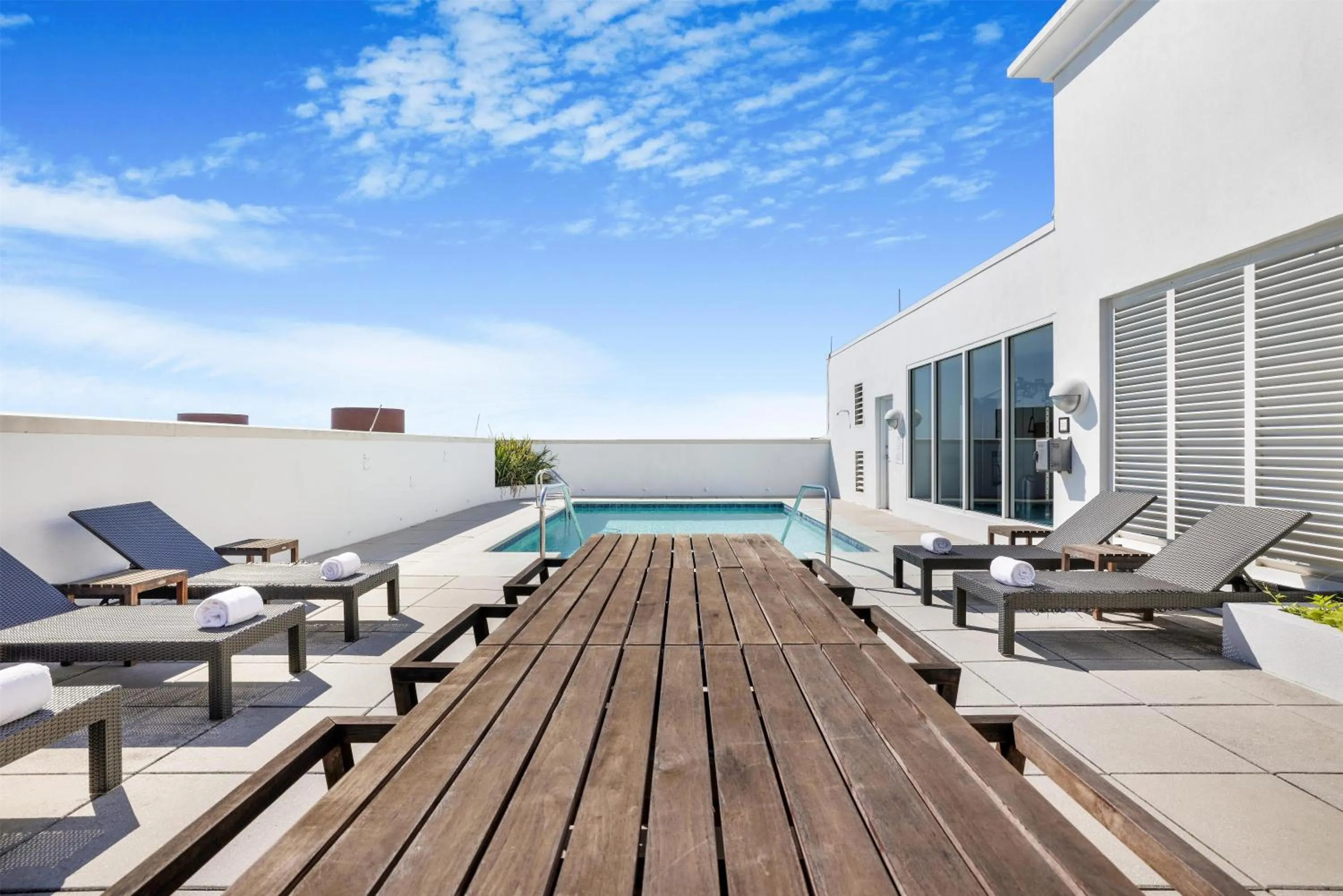 Pool view in The Banyan Hotel Fort Myers, Tapestry Collection by Hilton