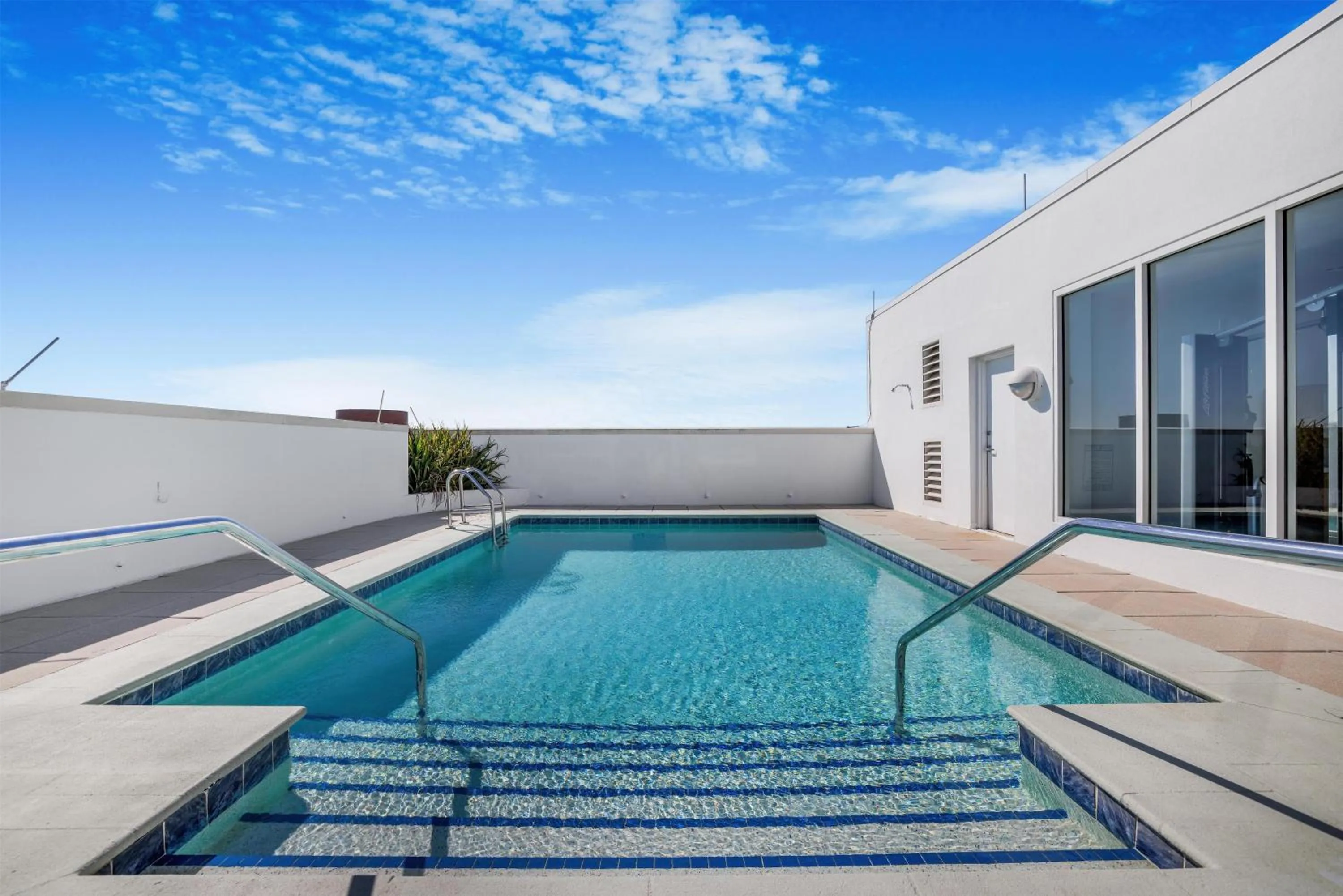Pool view in The Banyan Hotel Fort Myers, Tapestry Collection by Hilton