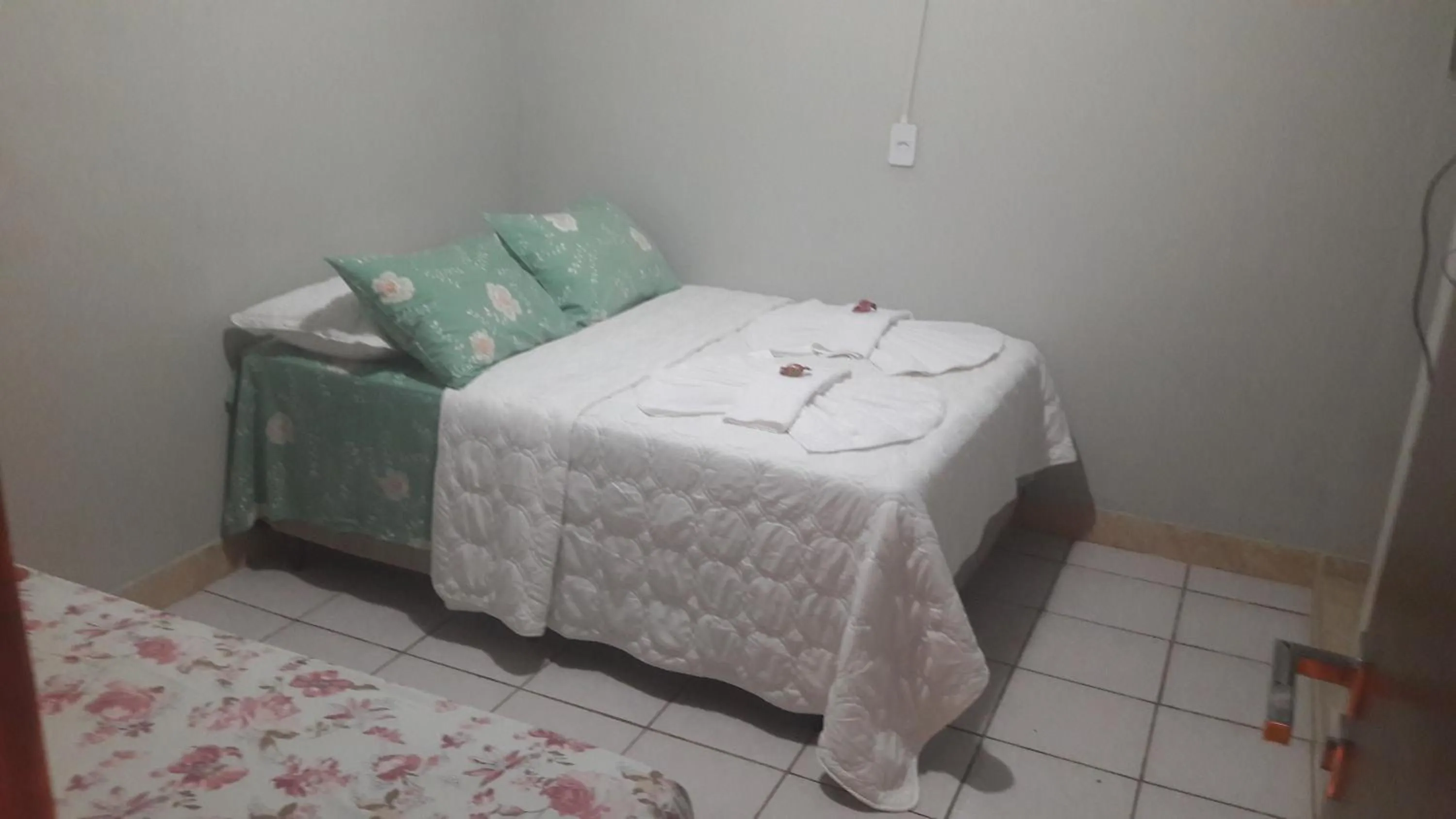Bed in Pousada Martins e Cia