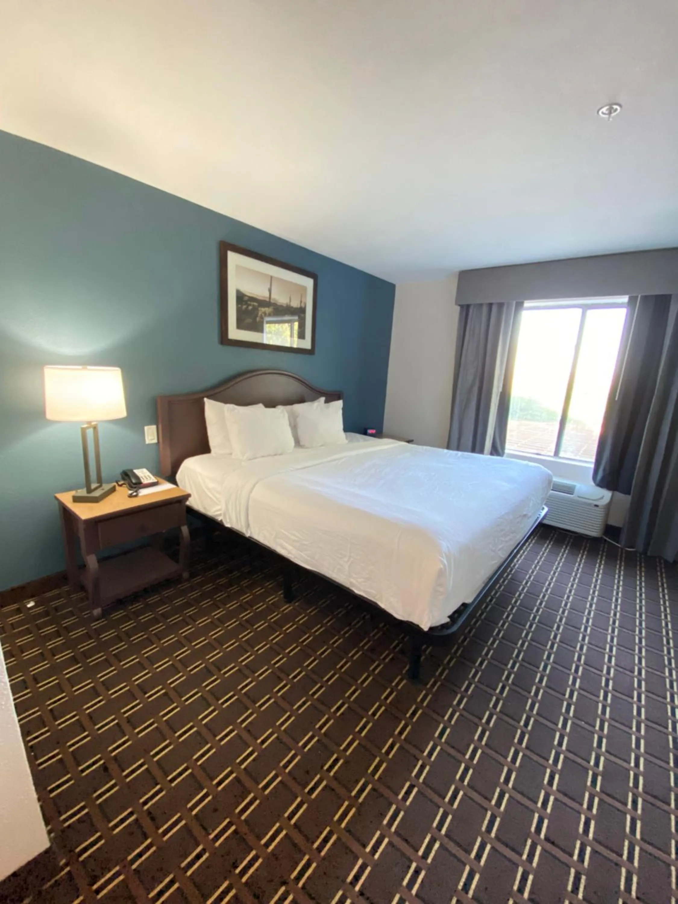 Bed in Tombstone Grand Hotel, a Baymont by Wyndham