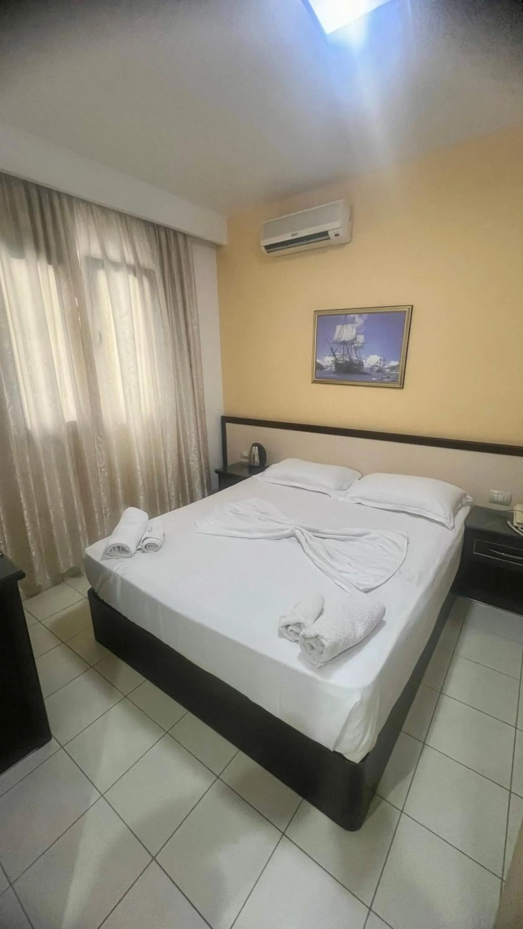 Bed in Sunrise Hotel Cameria