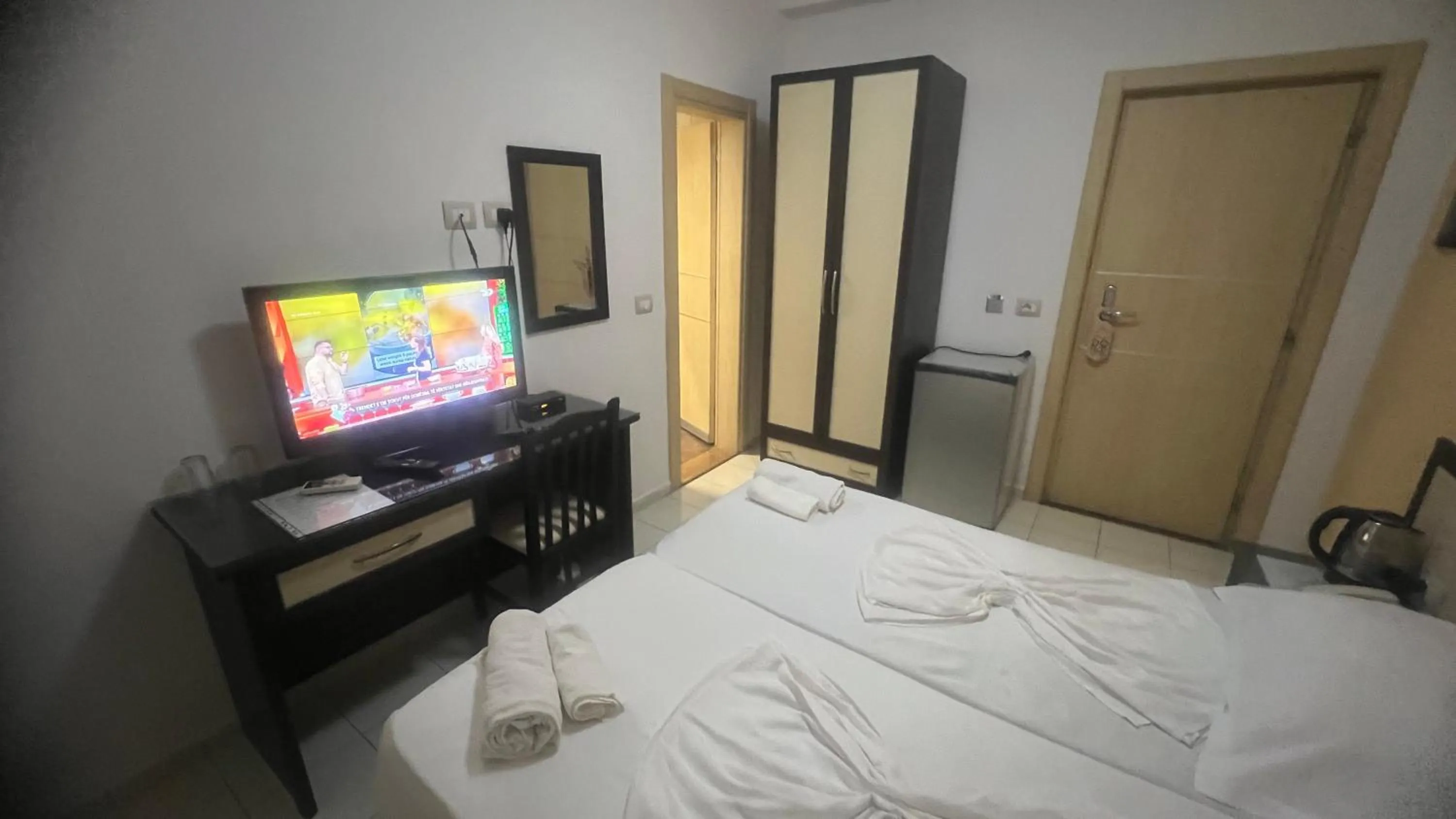 Bed in Sunrise Hotel Cameria