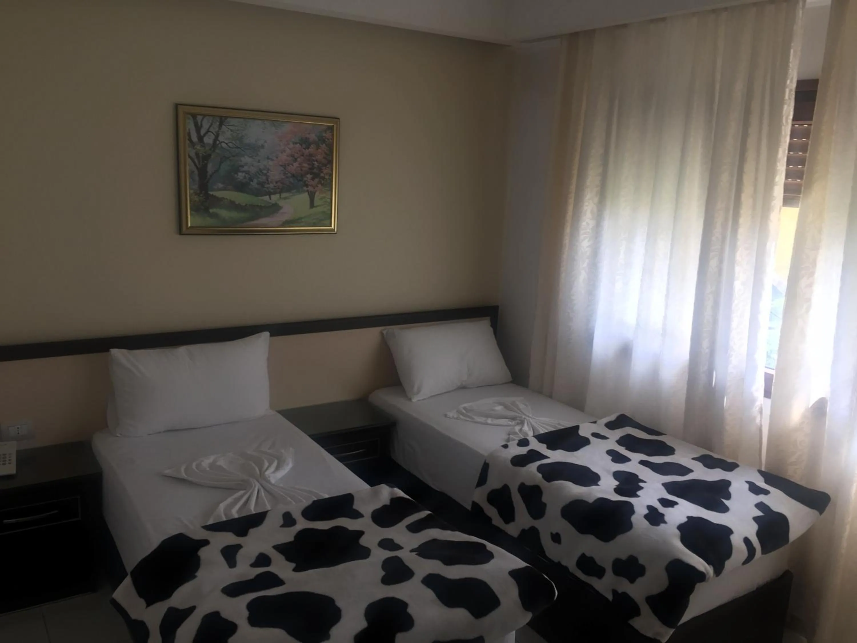 Bed in Sunrise Hotel Cameria