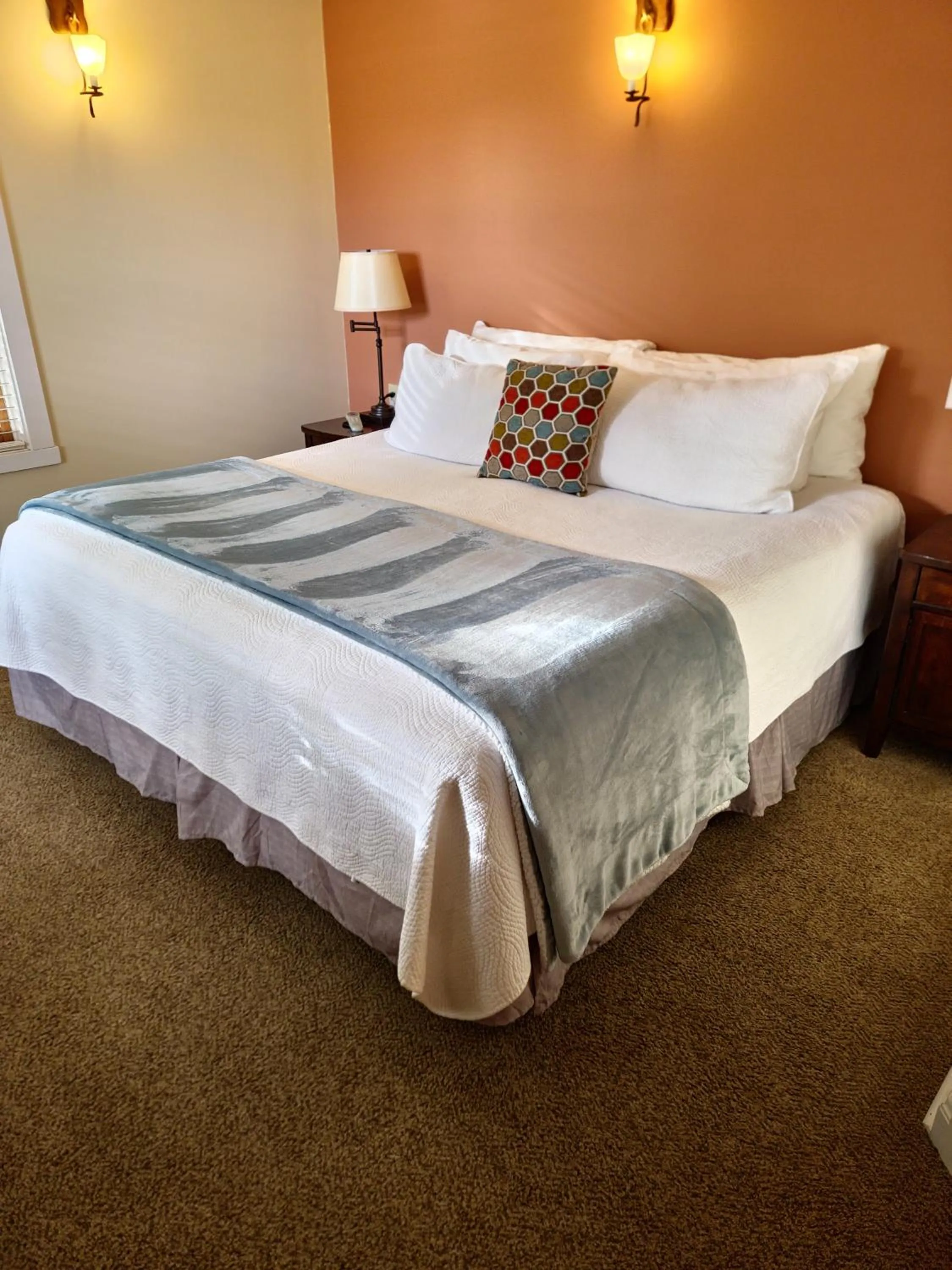 Bed in The Heron Inn and Day Spa