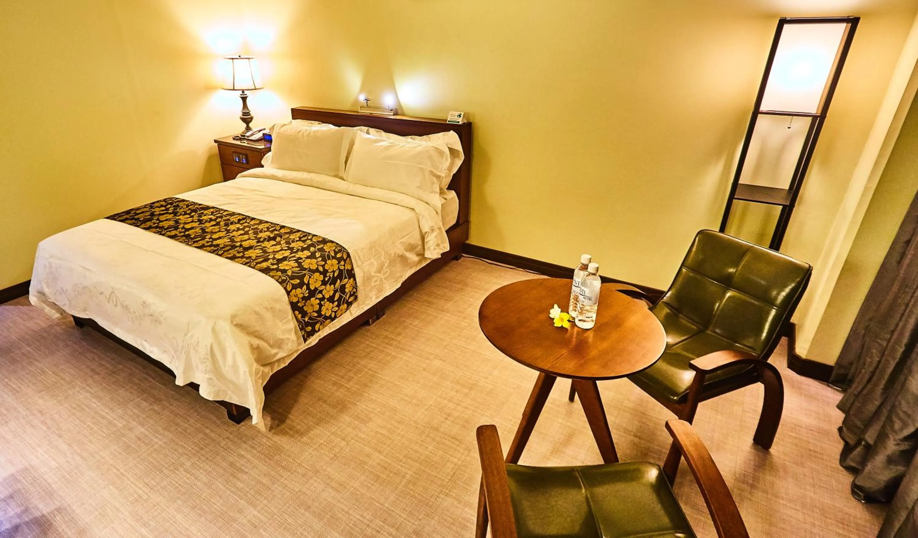 Photo of the whole room, Bed in Serenti Hotel Saipan