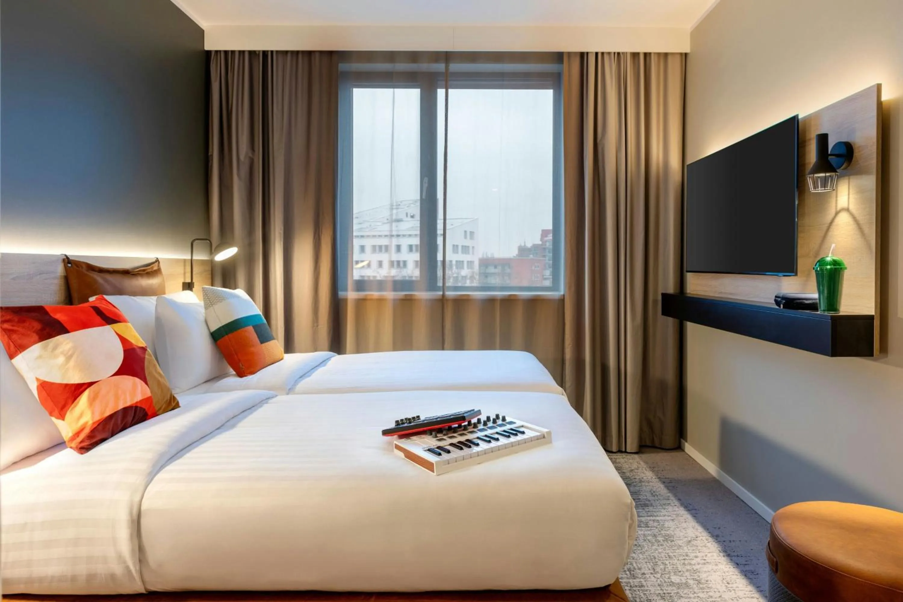 Photo of the whole room, Bed in Moxy Berlin Ostbahnhof