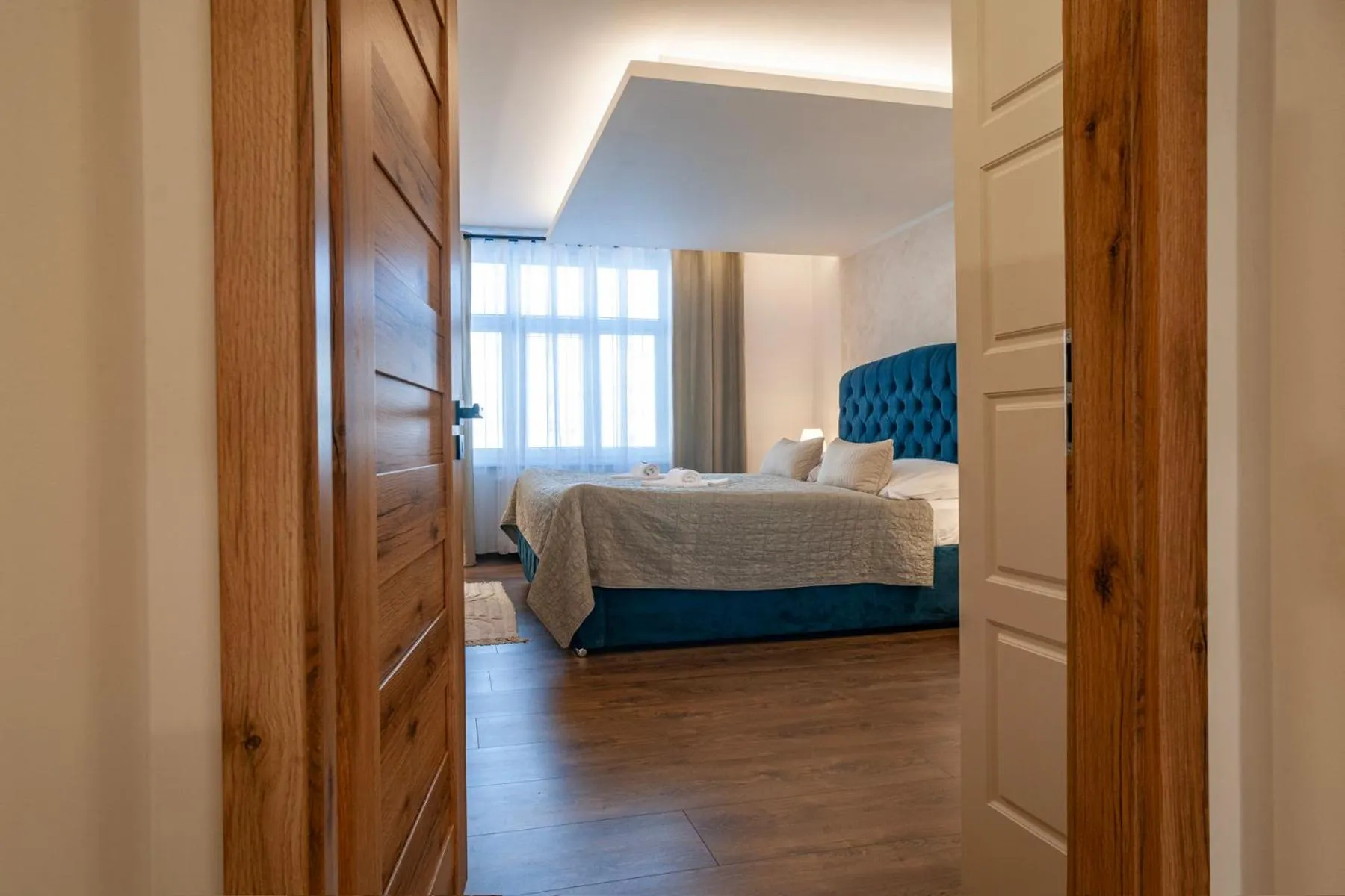 Bed in STING Boutique Apartments