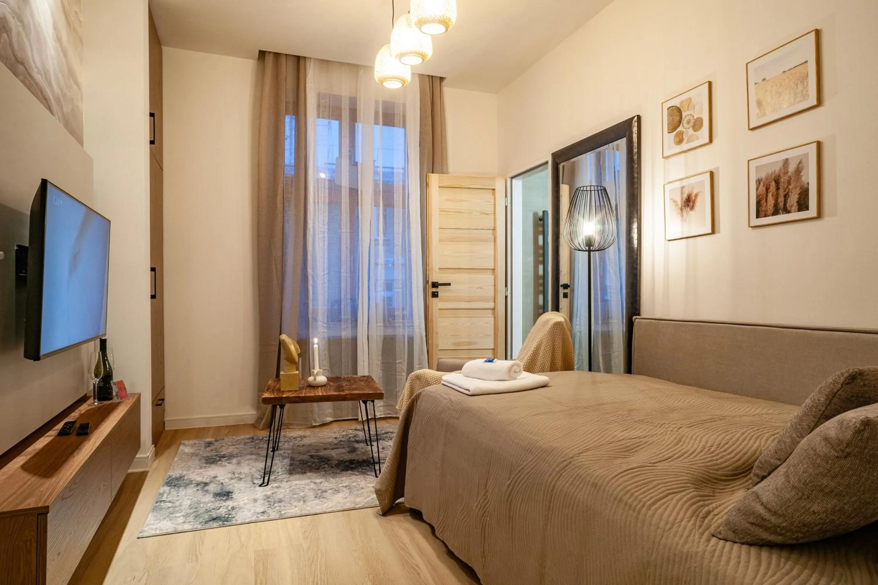 Bed in STING Boutique Apartments