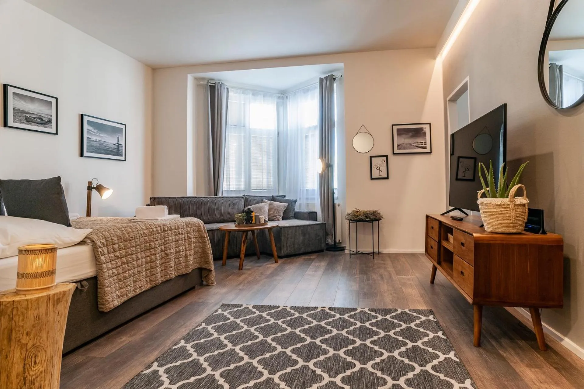 Bed in STING Boutique Apartments