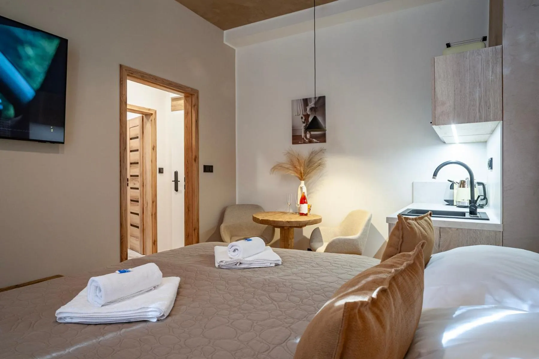 Bed in STING Boutique Apartments