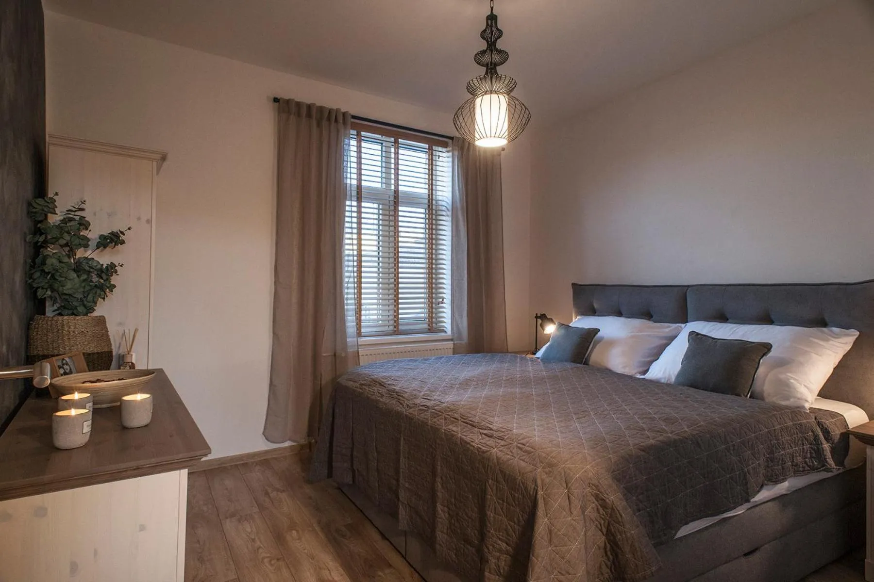 Bed in STING Boutique Apartments