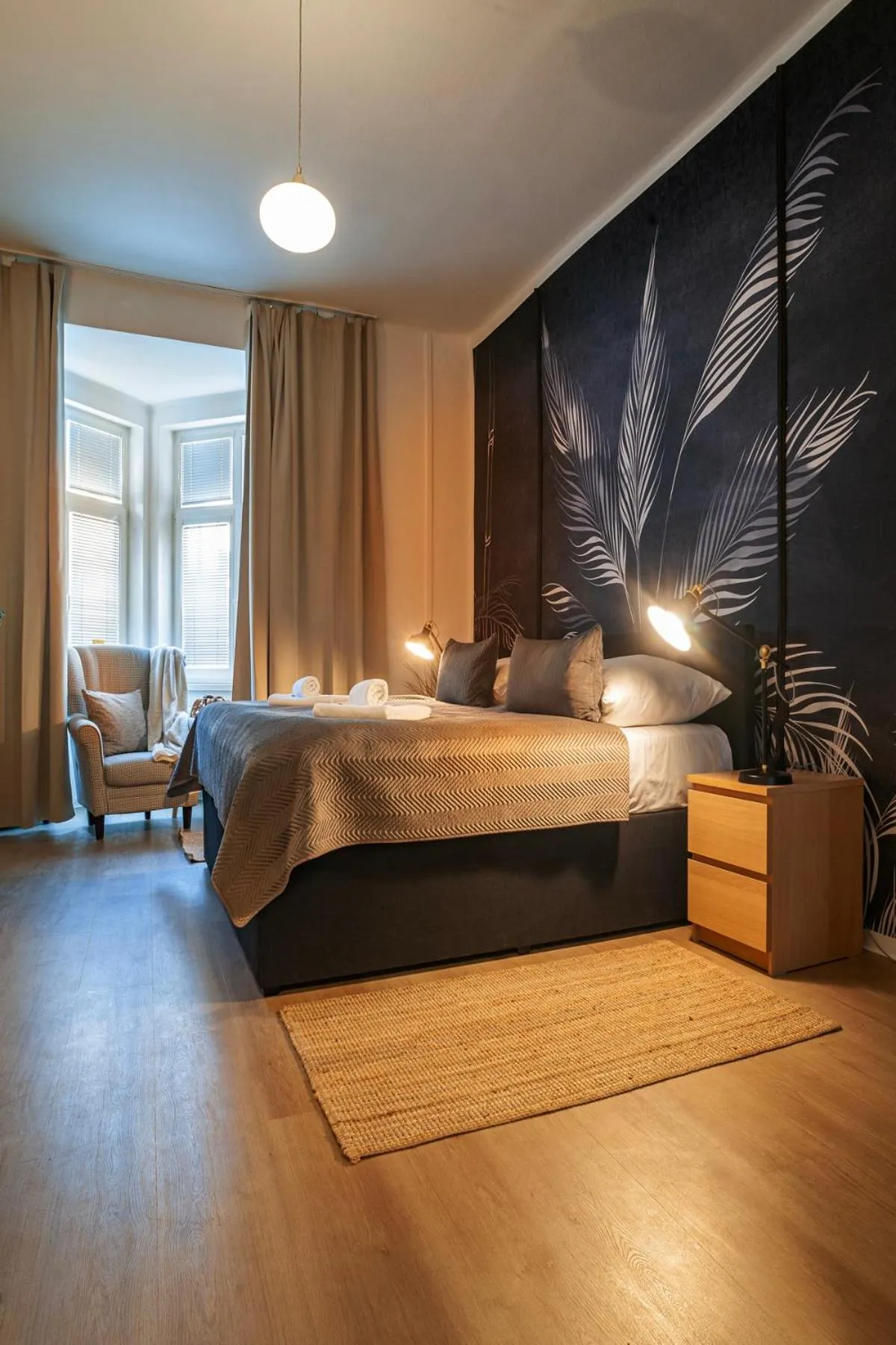 Bed in STING Boutique Apartments