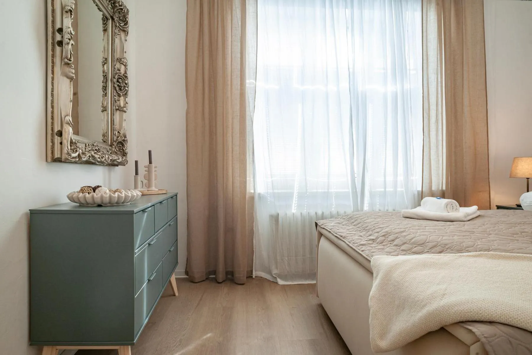 Bed in STING Boutique Apartments