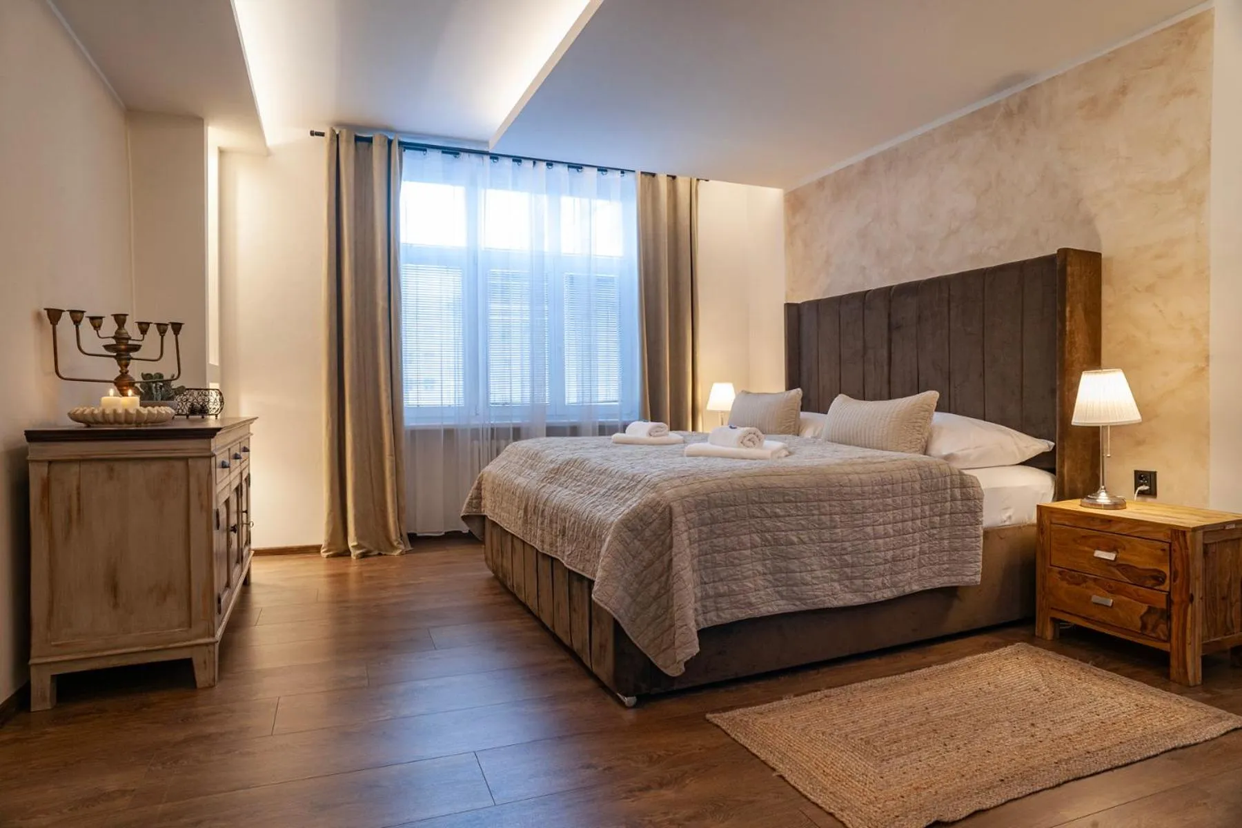 Bed in STING Boutique Apartments