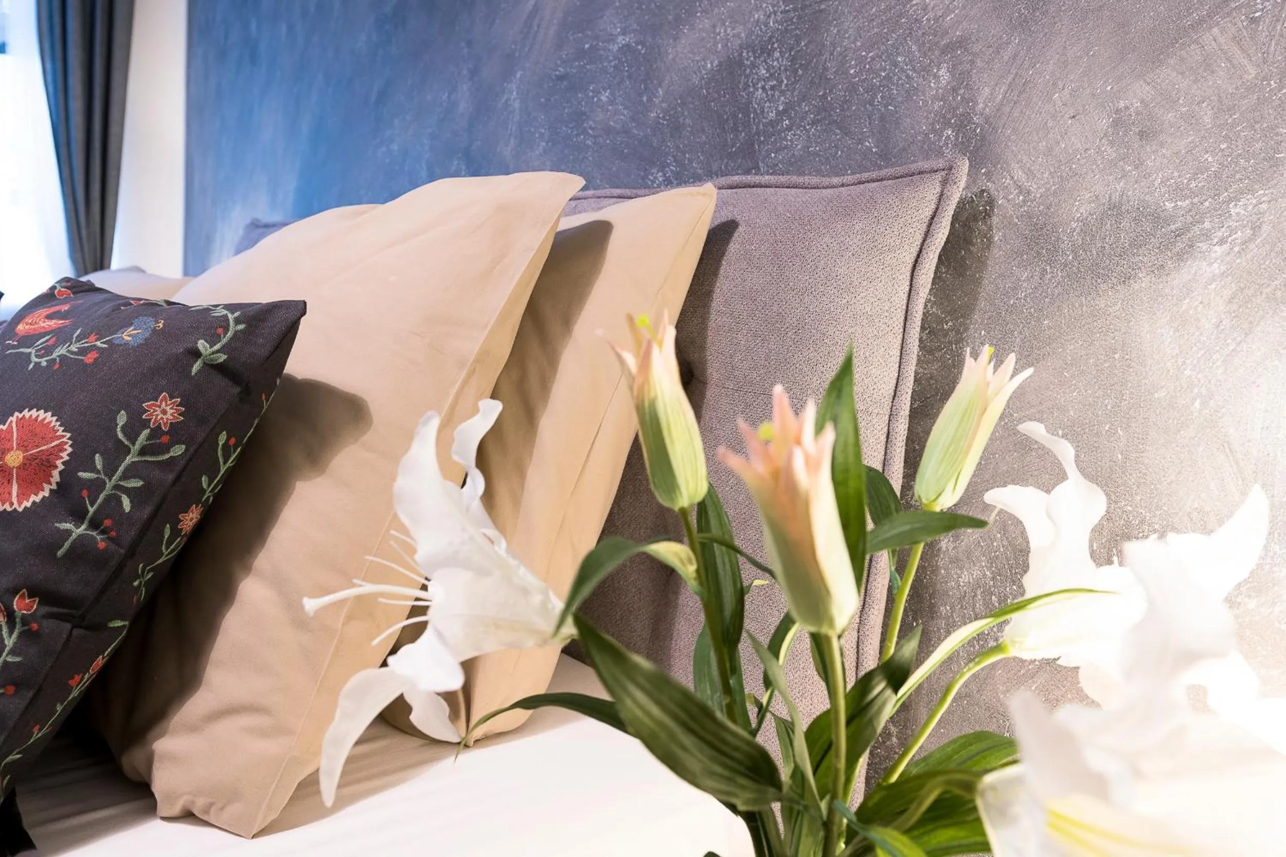 Bed in STING Boutique Apartments