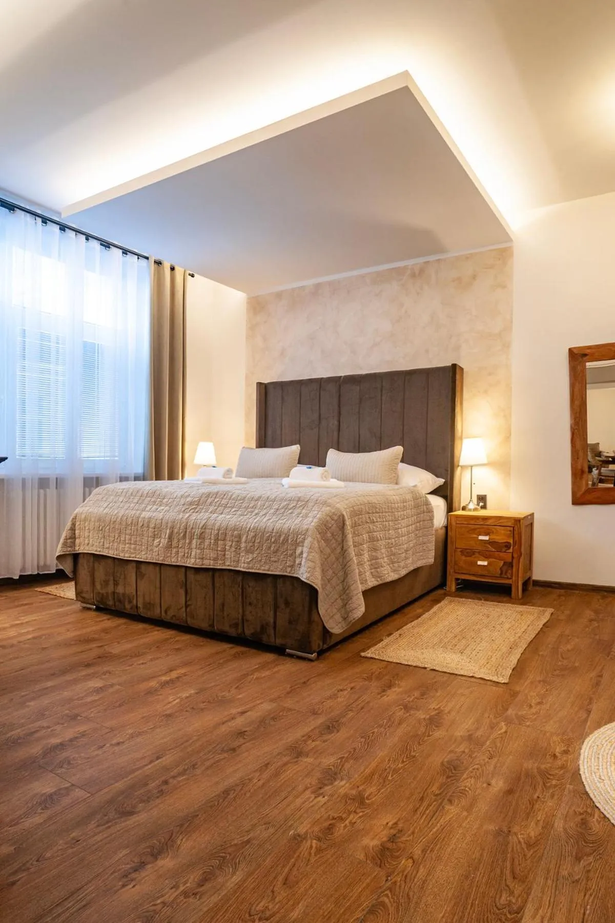 Bed in STING Boutique Apartments