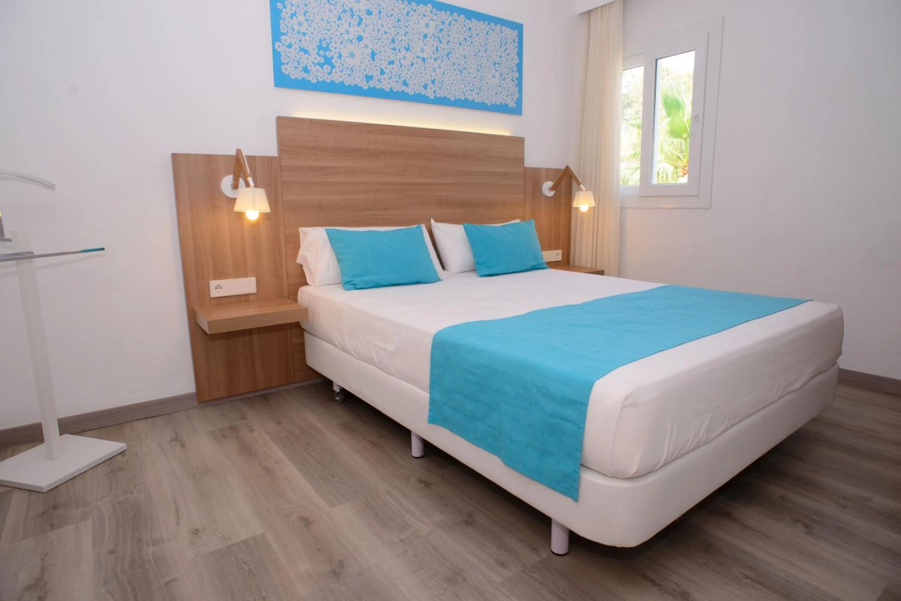 Photo of the whole room, Bed in Cala Llenya Resort Ibiza