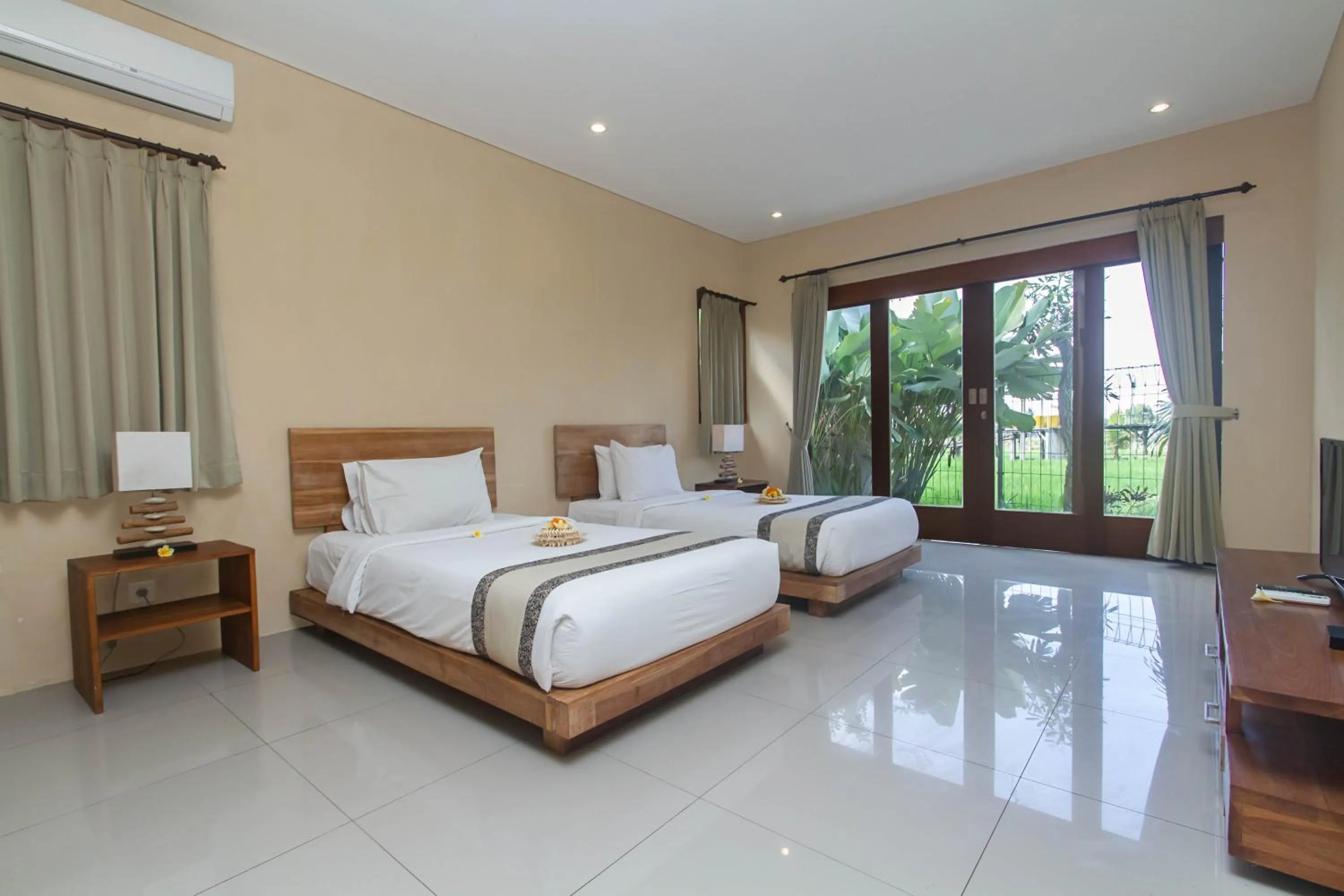 Bed in Kabinawa Ubud Villas by GenuineHost